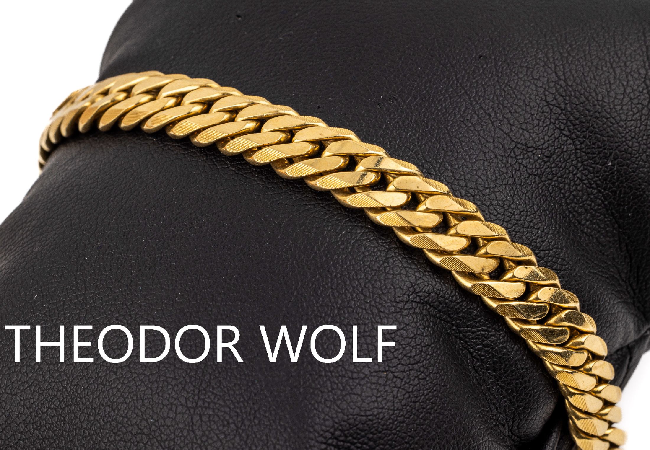 18 kt Gold THEODOR WOLF Flachpanzerarmband, GG 750/000, teilw. sat., L. ca. 19.5 cm, Kastenschloss mit Sicherheitsachten, ca. 36.0 g