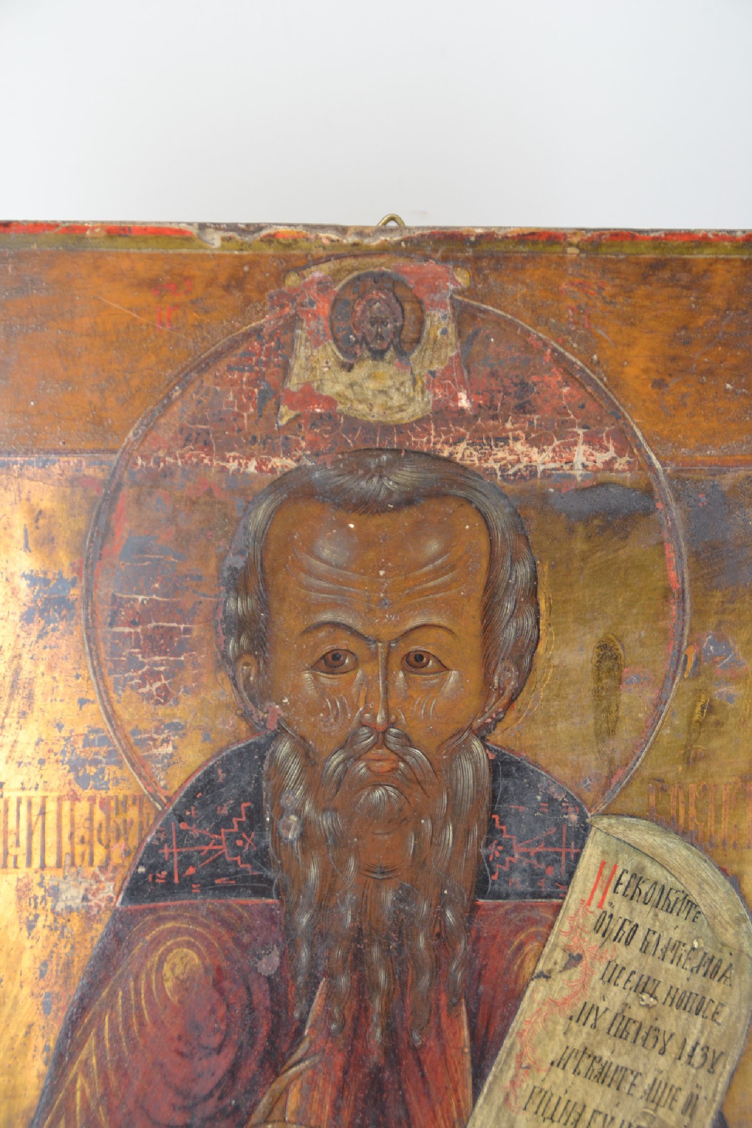 Detail b: Ikone, Russland, 19.Jh., Tempera auf Holz, Hl. Nikolaus flankiert von vier Randheiligen, Oberflächenschäden u. rest., 36x30 cm