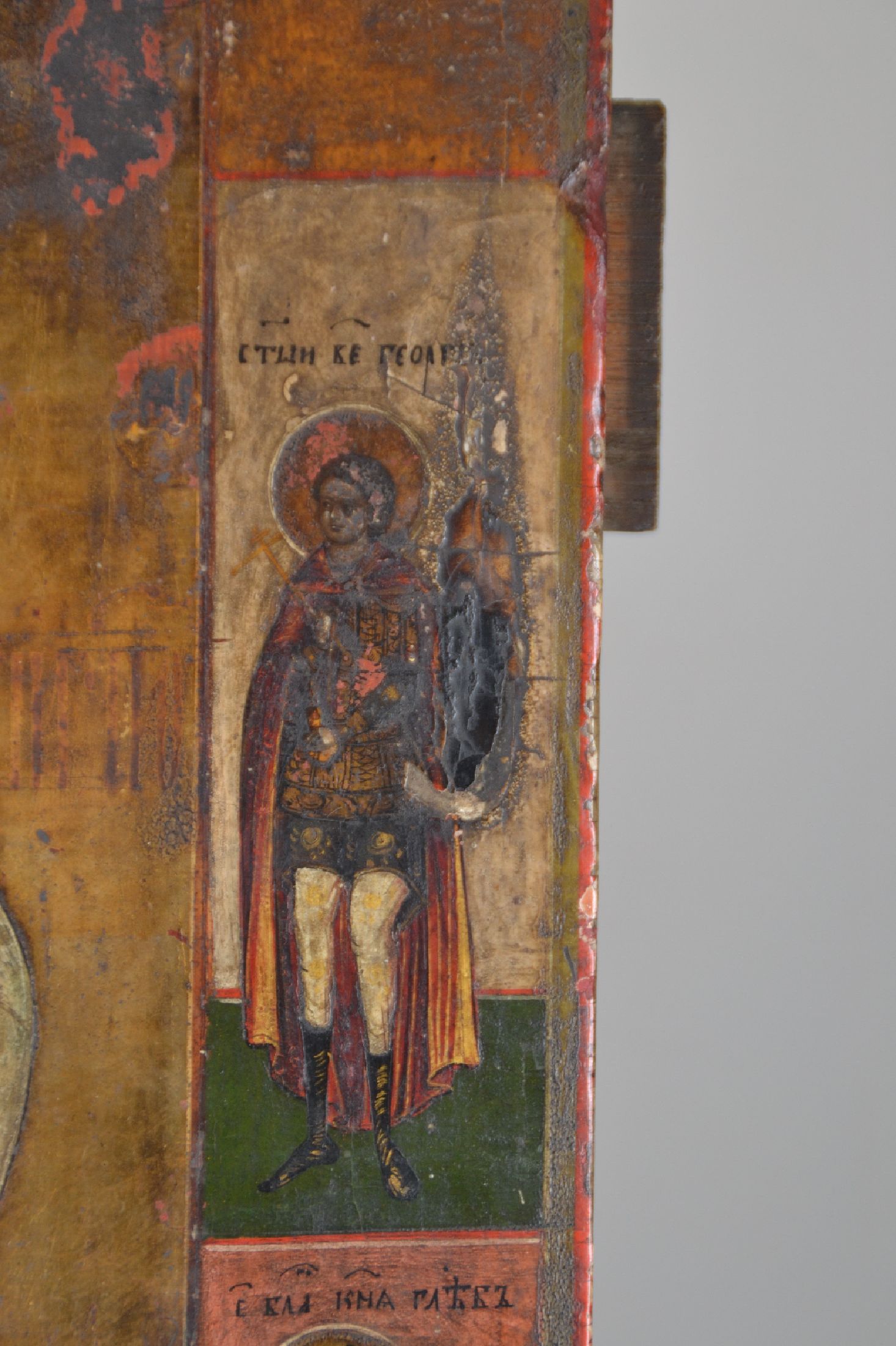 Detail c: Ikone, Russland, 19.Jh., Tempera auf Holz, Hl. Nikolaus flankiert von vier Randheiligen, Oberflächenschäden u. rest., 36x30 cm