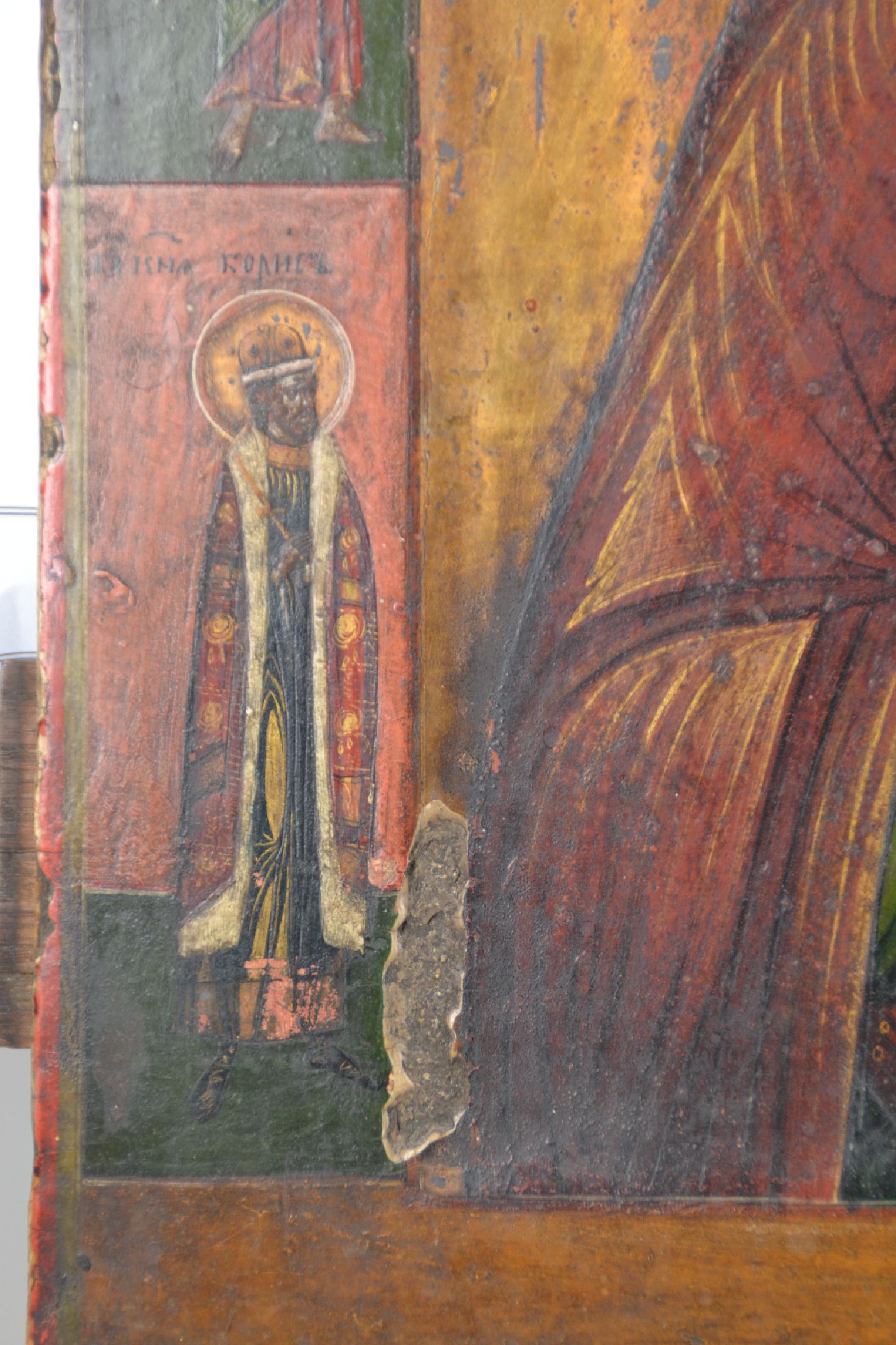 Detail d: Ikone, Russland, 19.Jh., Tempera auf Holz, Hl. Nikolaus flankiert von vier Randheiligen, Oberflächenschäden u. rest., 36x30 cm