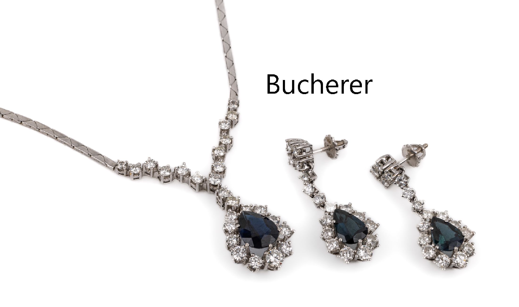 BUCHERER 18 kt Gold Saphir-Brillant-Schmuckset WG 750/000, best. aus: Collier und Paar Ohrgehänge, insgesamt 3 facett. Saphirtropfen zus. ca. 6.46 ...