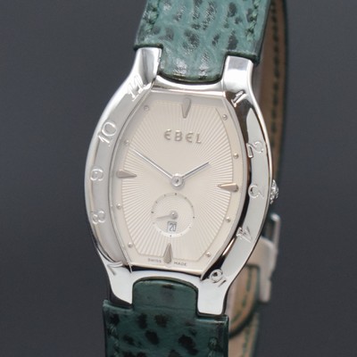 26699658a - EBEL Lichine ladies wristwatch reference 9012431, Switzerland, quartz, tonneau-shaped case in stainless steel, original leather strap with deployant clasp, bezel with Arabic numerals, silvered, engine-turned dial, measures approx. 39 x 28,5 mm, condition 2