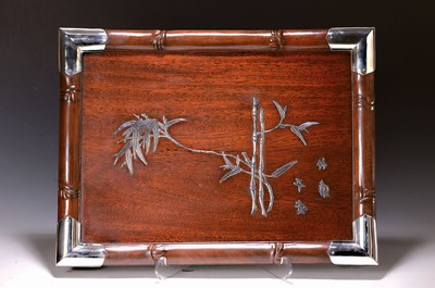 Image 26700675 - Serving tray made of rosewood, 20th century, applied silver application of bamboo and characters, frame carved in bamboo decoration and silver angles on the corners, approx. 60 x46 cm