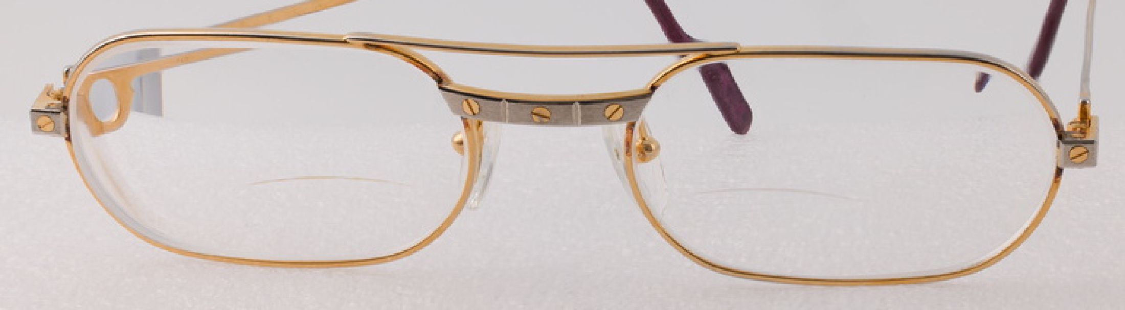 Detail a: CARTIER Brille, Metall verg., Frankreich, 55-20-140, Vergoldung berieben, sign. und num.Gläser mit Sehstärke, Gebr.-Spuren
