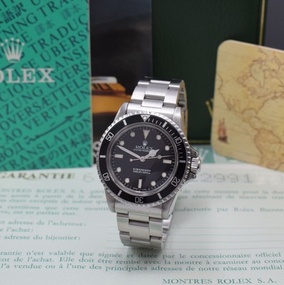 Image ROLEX Oyster Perpetual Submariner reference 5513 gents wristwatch with box and papers, Switzerland, self winding, screwed down oystercase in steel, Oyster-bracelet reference 93150with deployant clasp, bidirectional revolving bezel, black dial with luminous indices, luminous hands, calibre 1520, diameter approx.40 mm, length approx. 19,5 cm, original box, certificate without seller-note and description enclosed, condition 2