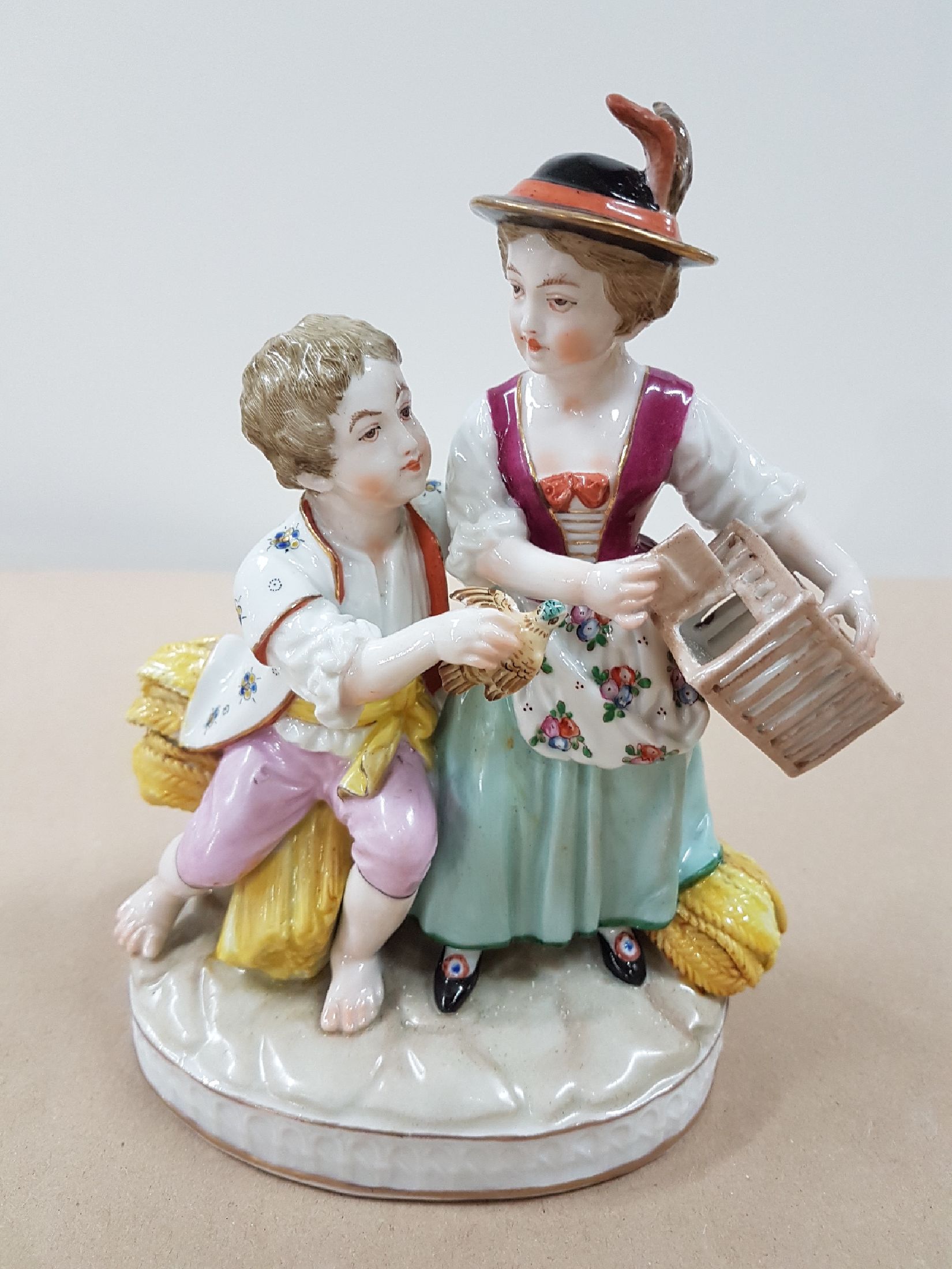 Detail a: Porzellanfigur, Volkstedt, um 1900, Mädchen und Junge mit Vogel und Käfig, bunt bemalt, H. ca. 17cm