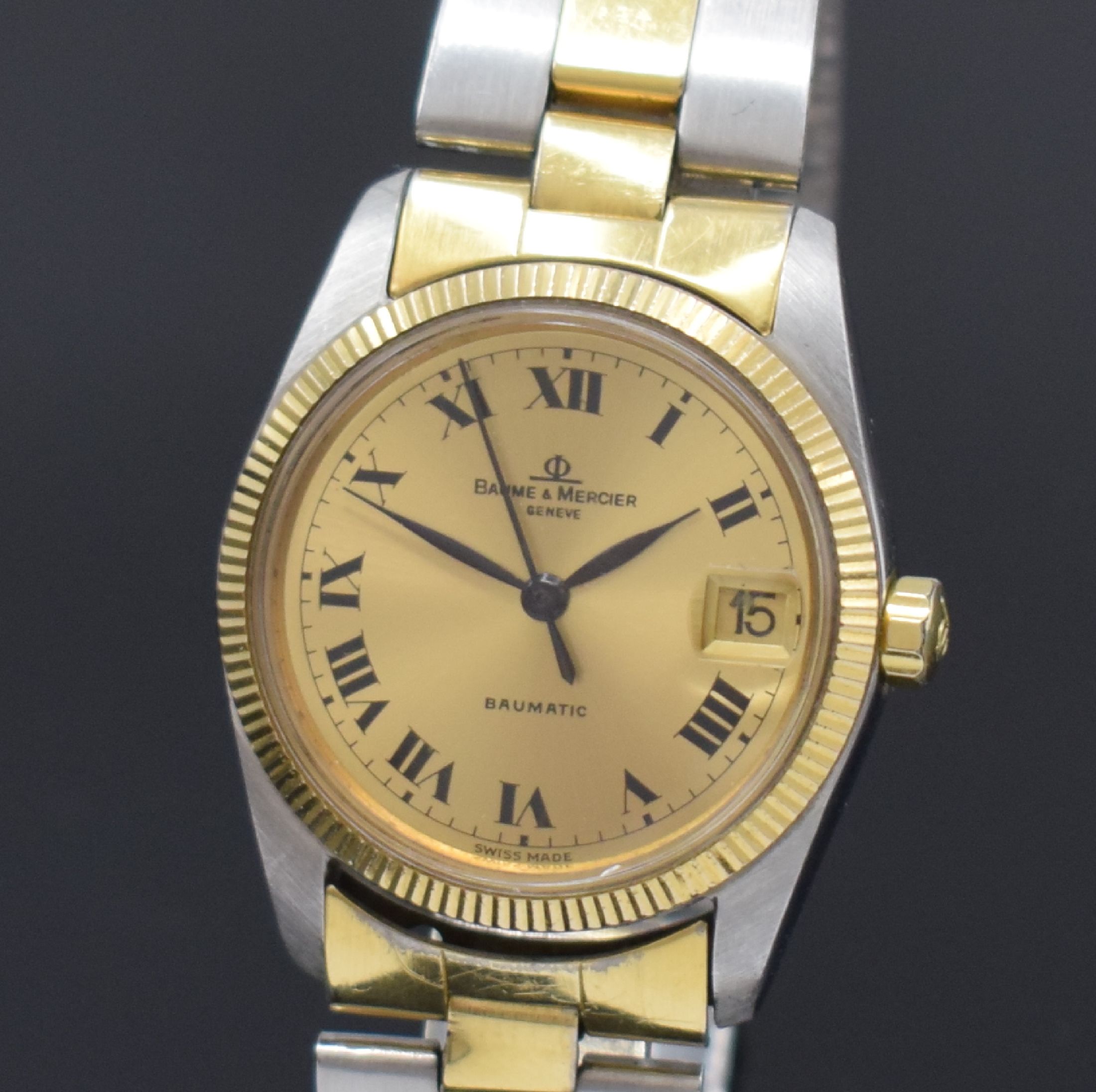 Detail a: BAUME & MERCIER Baumatic Armbanduhr Referenz 1187 in Stahl/Gold, Schweiz um 1970, Automatik, 2-teil. Geh., Boden geschr., orig. Gliederband m. ...