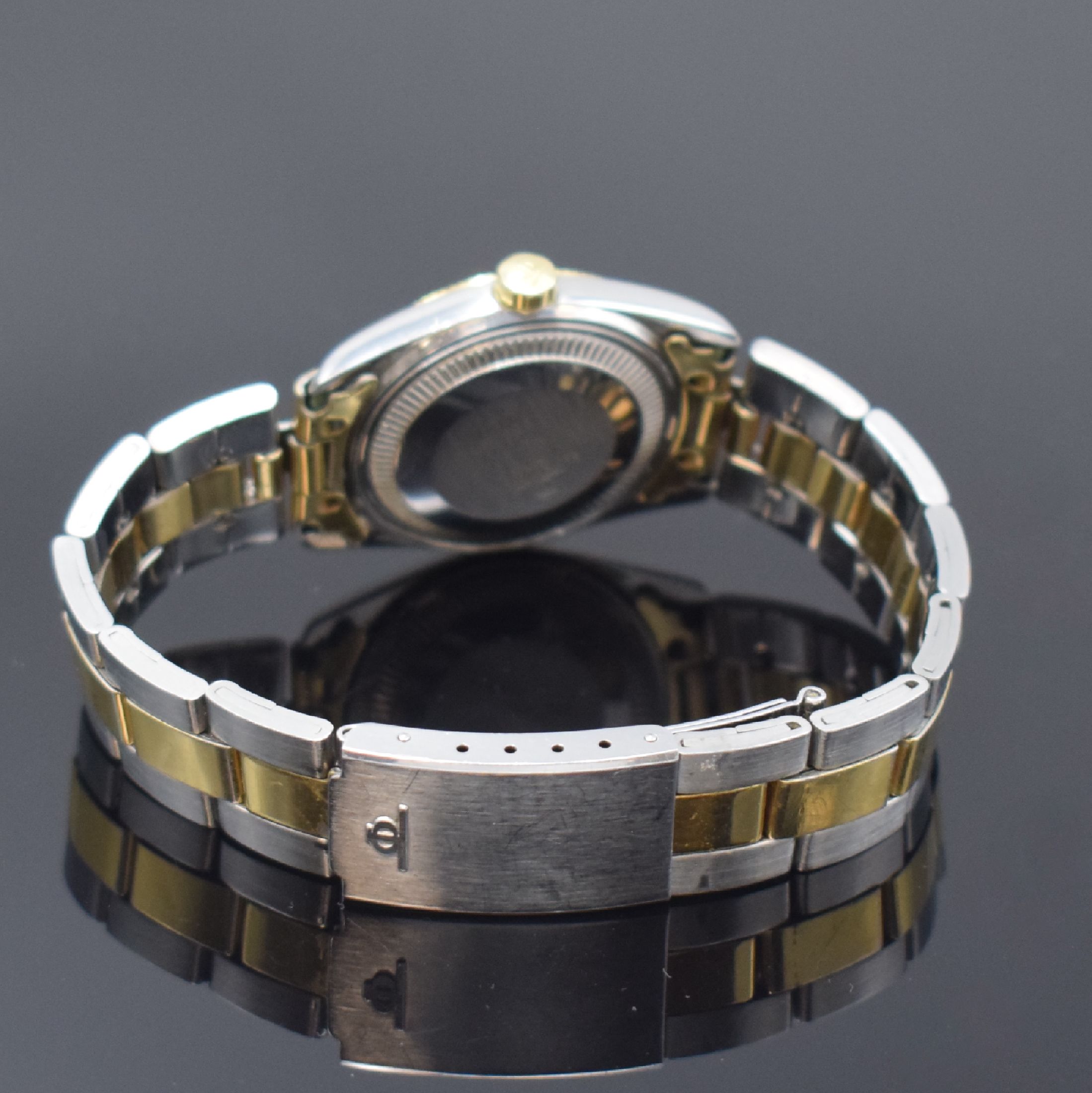 Detail b: BAUME & MERCIER Baumatic Armbanduhr Referenz 1187 in Stahl/Gold, Schweiz um 1970, Automatik, 2-teil. Geh., Boden geschr., orig. Gliederband m. ...