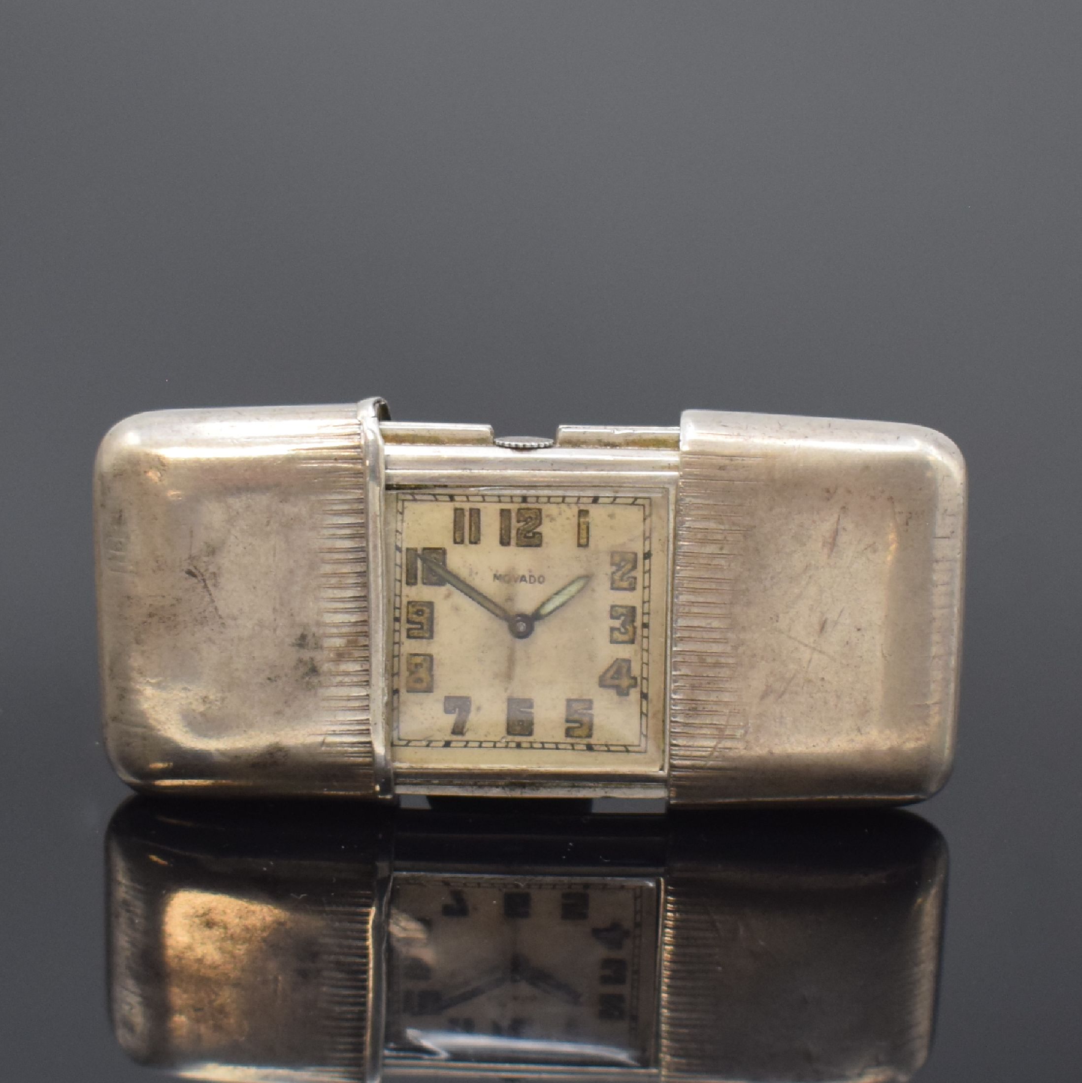 MOVADO Ermeto Reiseuhr in 935er Silber, Schweiz um 1935, Geh. dell., Aufzug durch aufschieben u. schließen, silb. Zifferbl. pat./fl., arab. ...