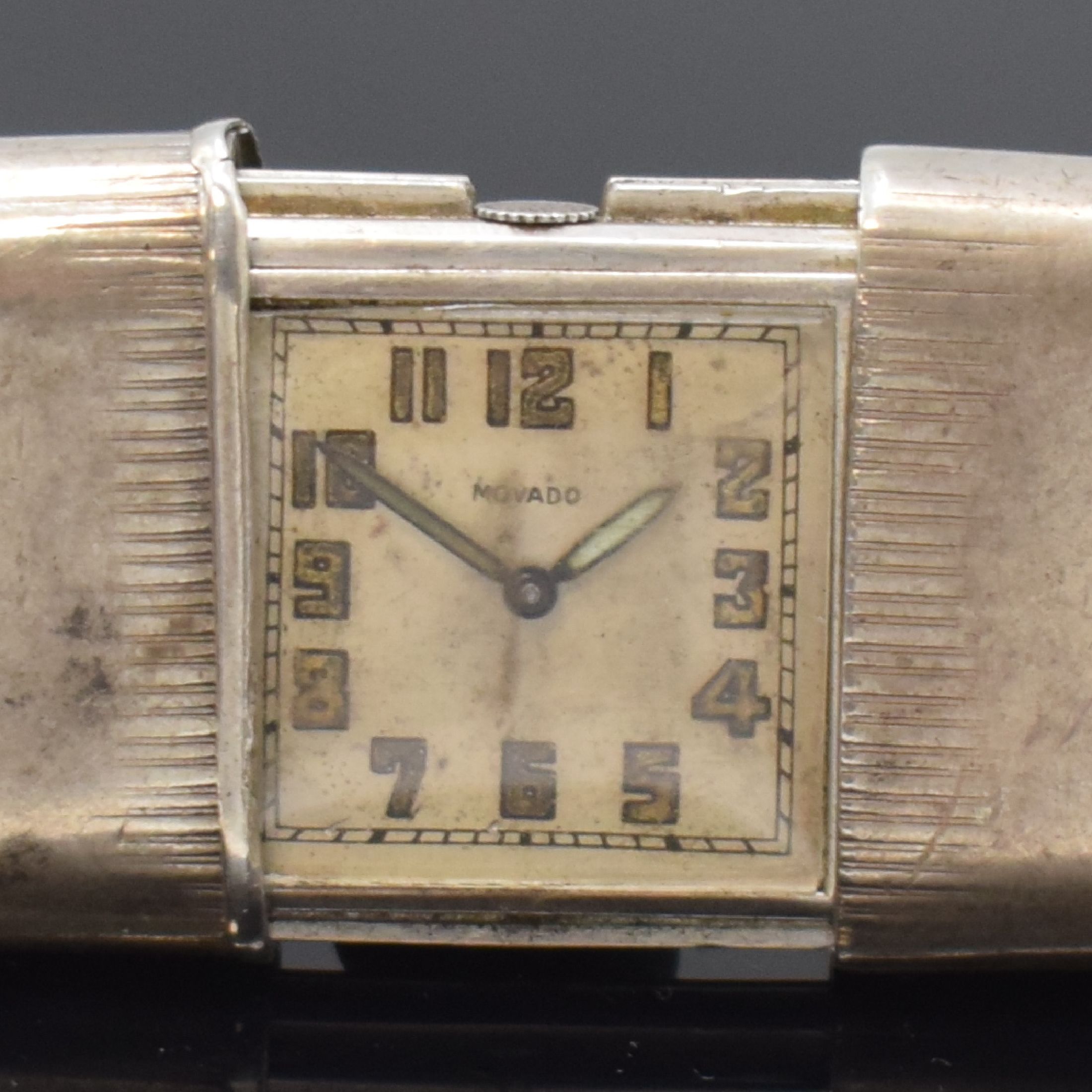 Detail a: MOVADO Ermeto Reiseuhr in 935er Silber, Schweiz um 1935, Geh. dell., Aufzug durch aufschieben u. schließen, silb. Zifferbl. pat./fl., arab. ...