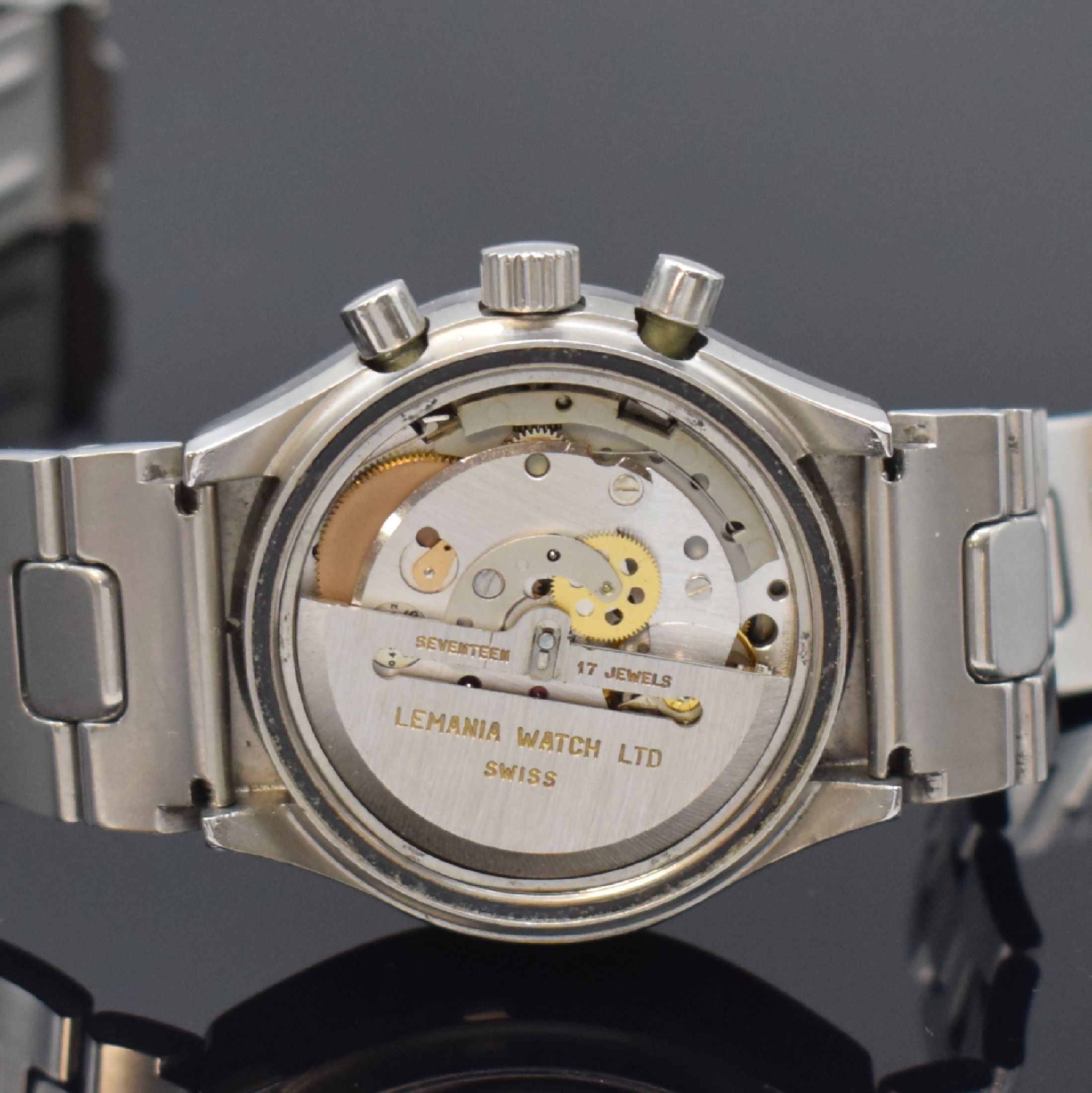 Detail d: SINN Herrenarmbanduhr mit Chronograph in Stahl, Schweiz um 1990, Automatik, neutr. Gliederband m. Faltschl., Boden verschr., schwarzes Zifferbl. m. ...