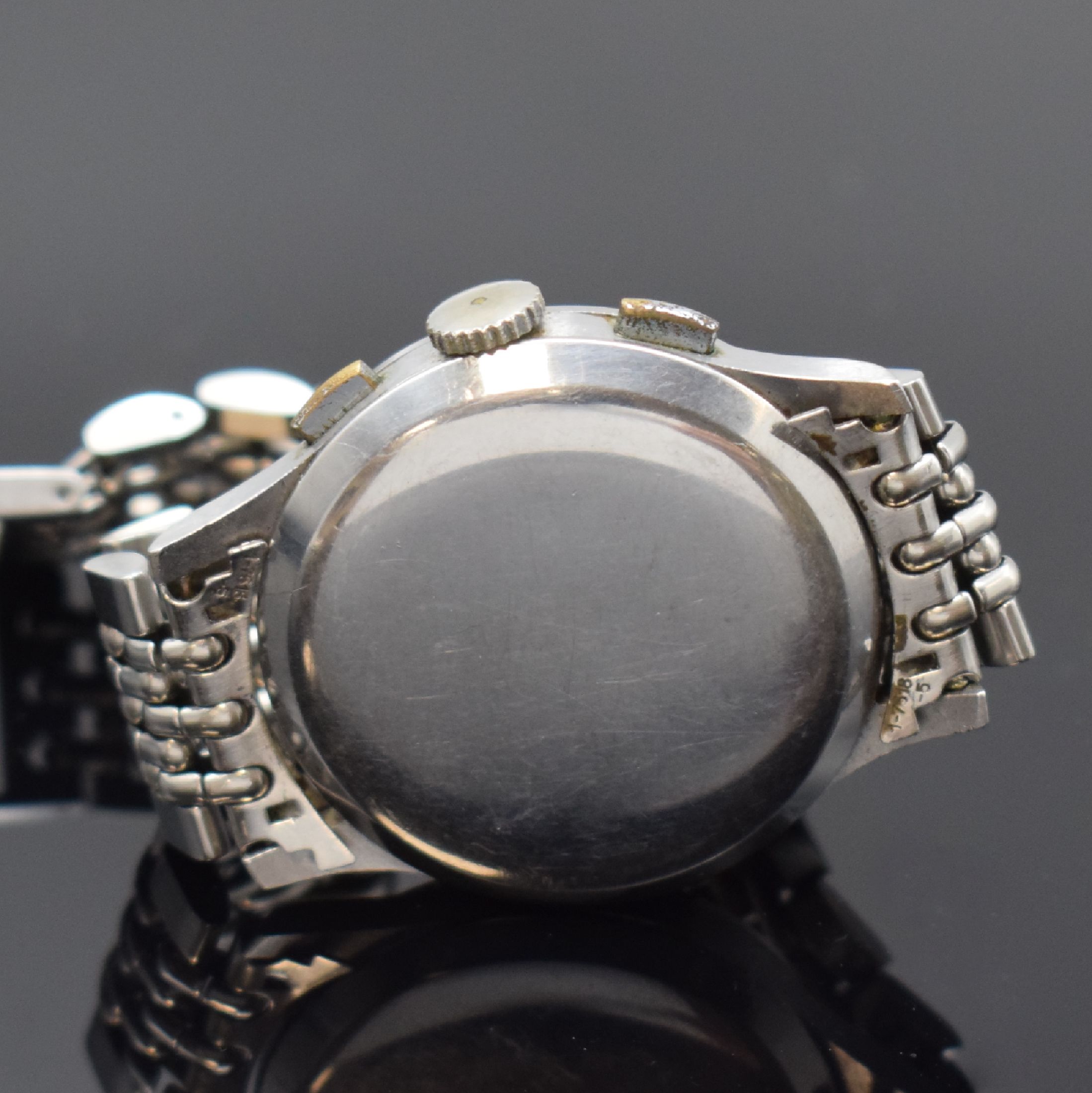 Detail c: ANGELUS Herrenarmbanduhr mit Schaltradchronograph in Stahl, Schweiz um 1945, Handaufzug, Boden aufgedr., neutr. Stahlband, silb. Zifferbl. m. arab. ...