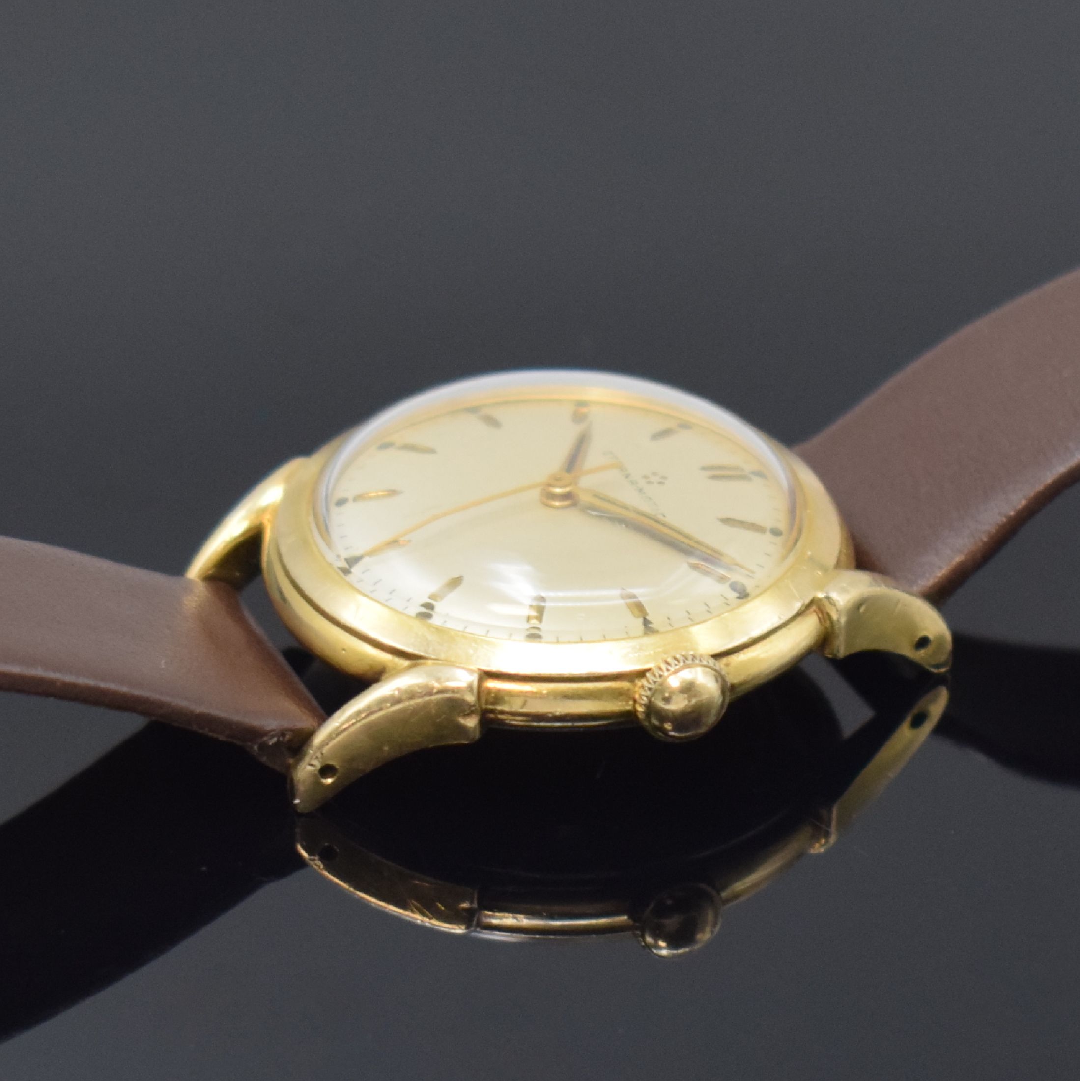 Detail b: ETERNA-MATIC vergoldete Herrenarmbanduhr, Schweiz um 1950, Automatik, Stahlboden verschr., silb. Zifferbl. m. gold. Std.-Ind., gold. Zeiger, Kal. ...