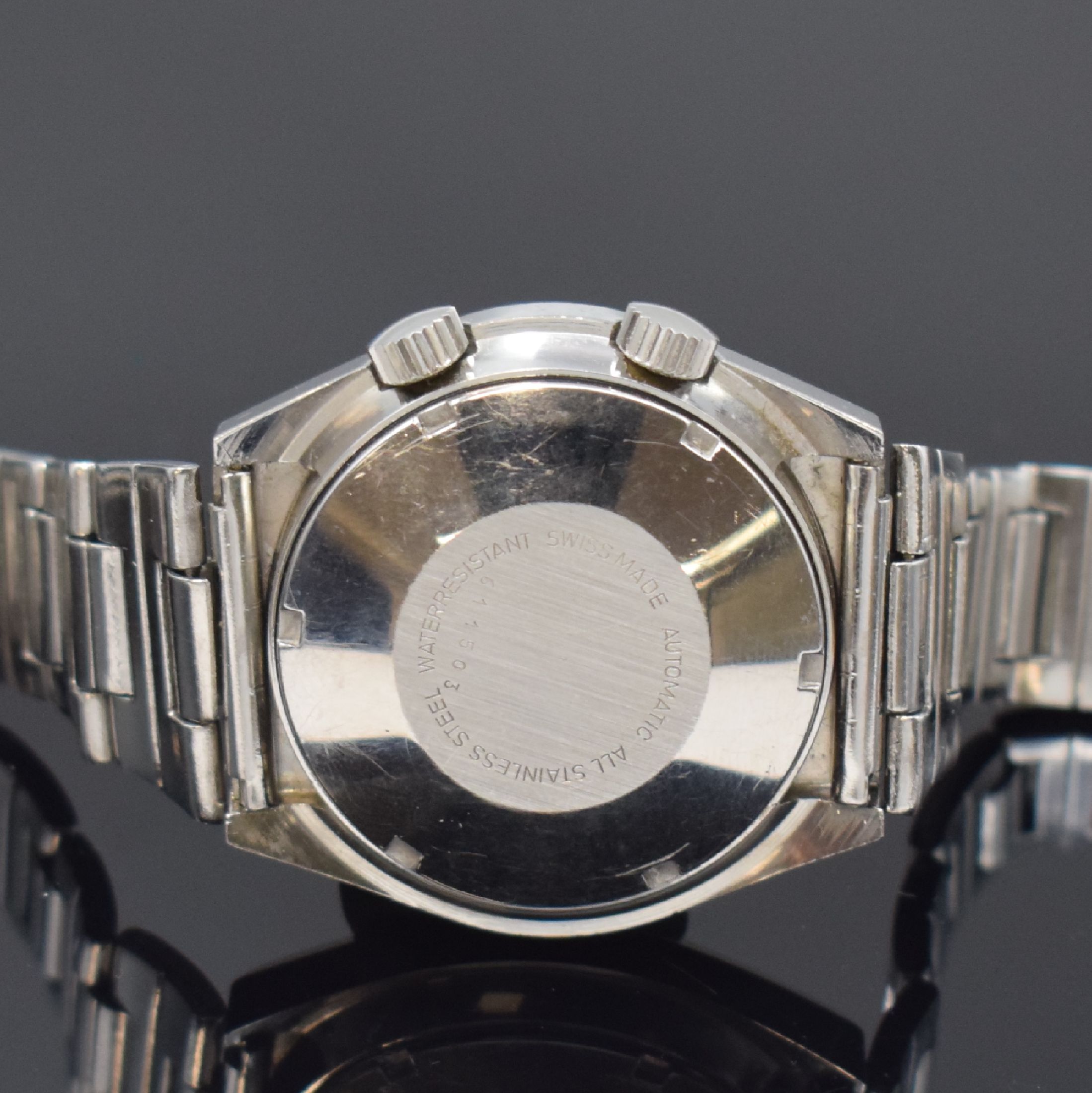 Detail c: PREDIAL Herrenarmbanduhr mit Wecker in Stahl, Schweiz um 1970, Automatik, tonneauförm. Geh., Boden verschr., neutr. Stahlband m. Faltschl., silb. ...