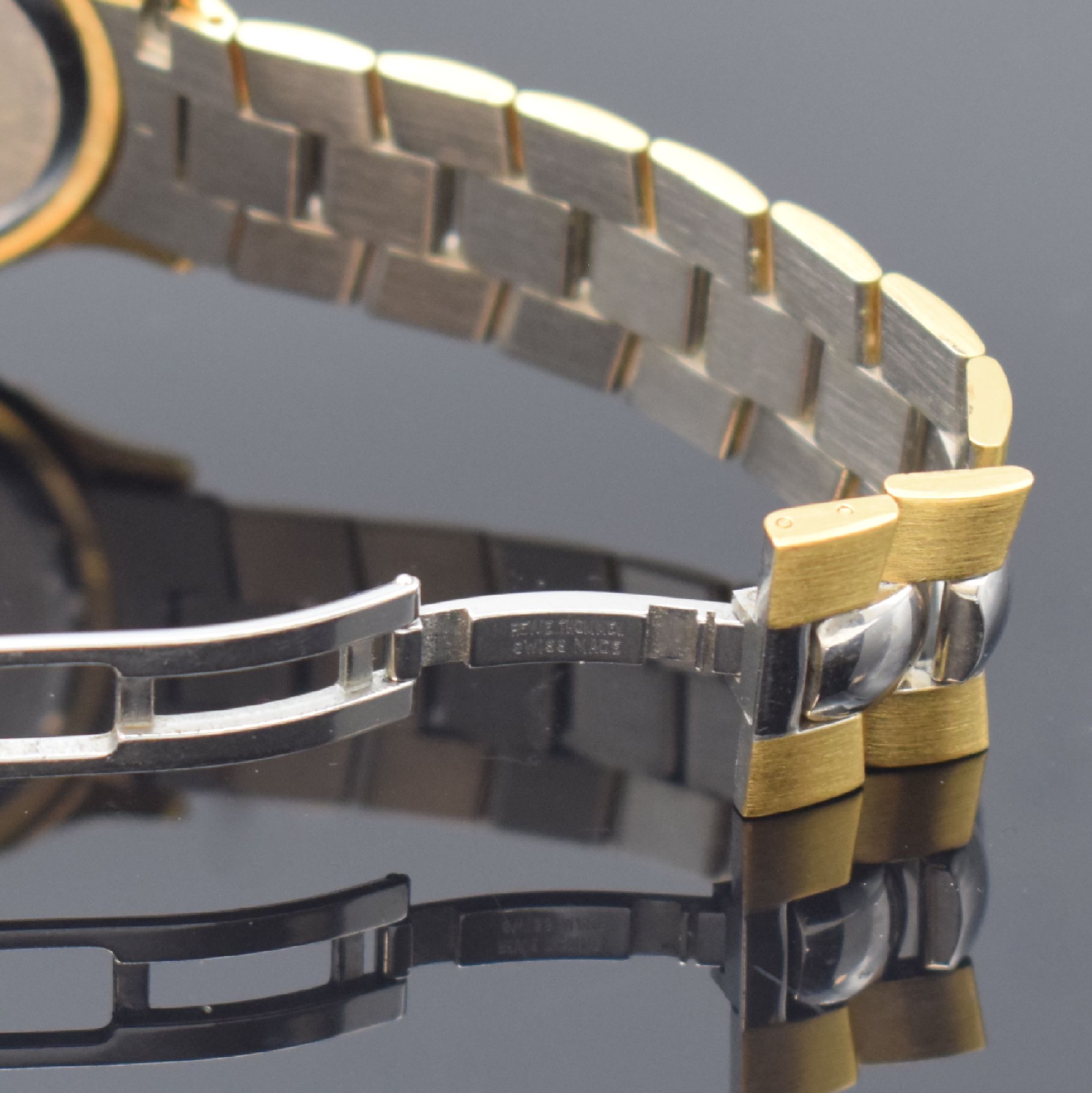 Detail b: REVUE THOMMEN Landmark Herrenarmbanduhr in Stahl/Gold, Schweiz um 1990, quarz, orig. Gliederband m. dopp. Faltschl., Stahlboden aufgedr., schwarzes ...