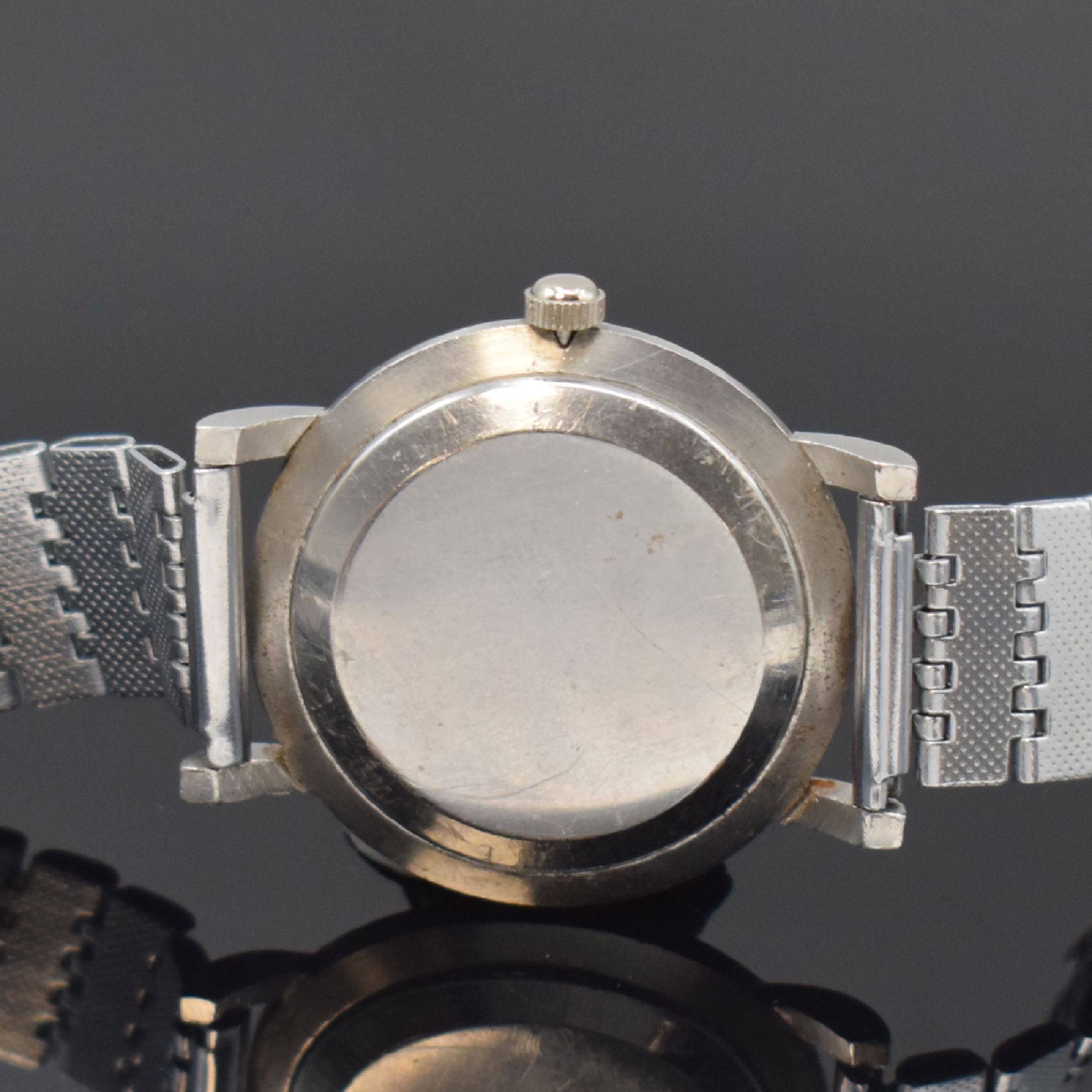 Detail c: MOVADO Herrenarmbanduhr in Stahl Referenz 18463, Schweiz um 1950, Hammerautomatik, neutr. Band, Boden aufgedr., Zifferbl. m. silb. Std.-Ind. u. ...