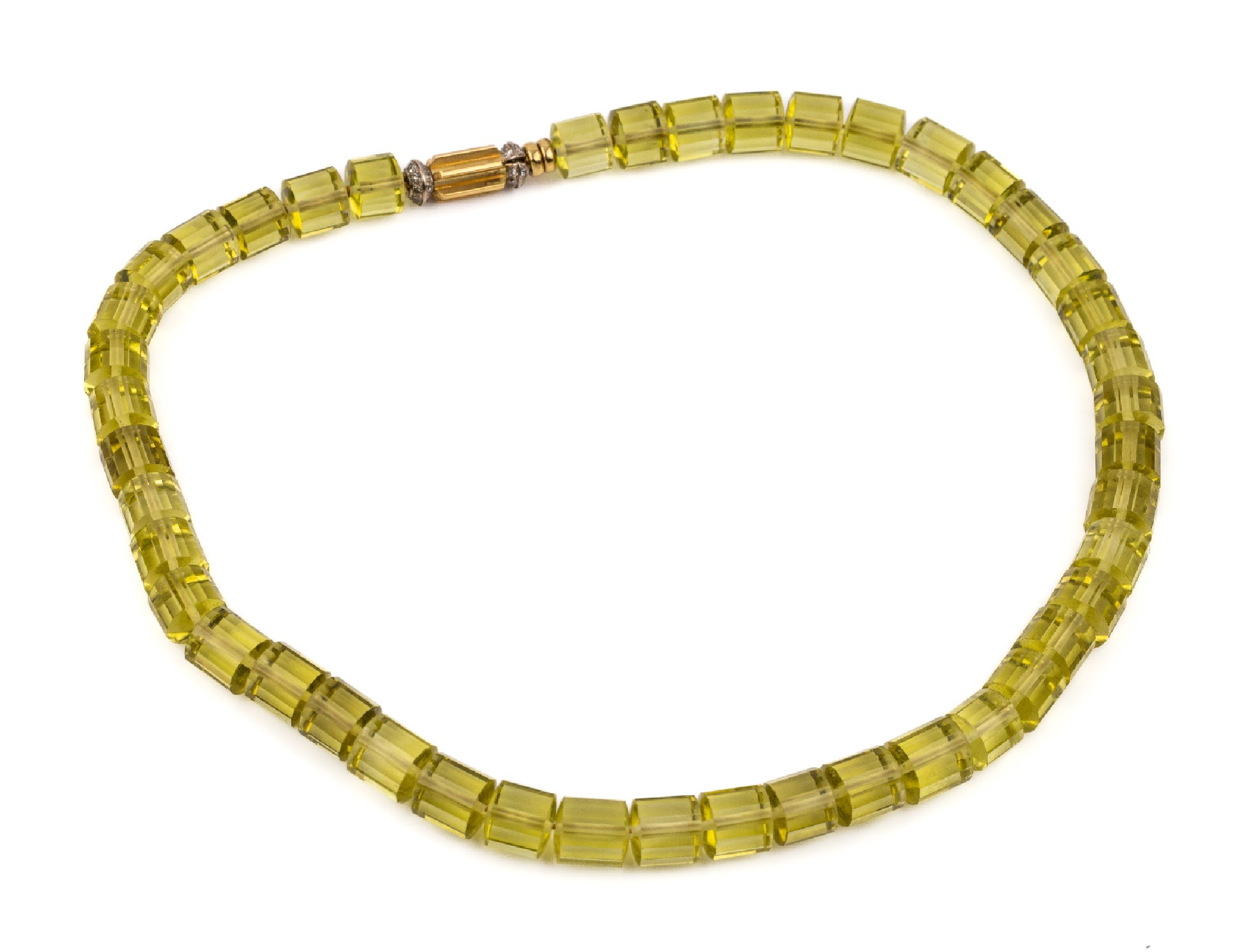 Peridot-Collier, 18 kt Gold Schließe, GG 750/000, mit kl. 8/8-Diamanten, facett. Peridot-Tönnchen im Verlauf, L. ca. 41.5 cm