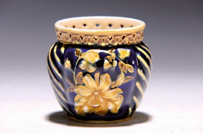Image 26704504 - Decorative vase, Vilmos Zsolnay, Pecs, Hungary, around 1878, ceramic, cream-colored body, royal blue glazed, gold decoration, floral and wave decoration in relief, edge with breakthrough work, form 3317 used 1873 - 1879, mark 1878-1896, traces of age, H. 6.1 cm, D. 7 cm