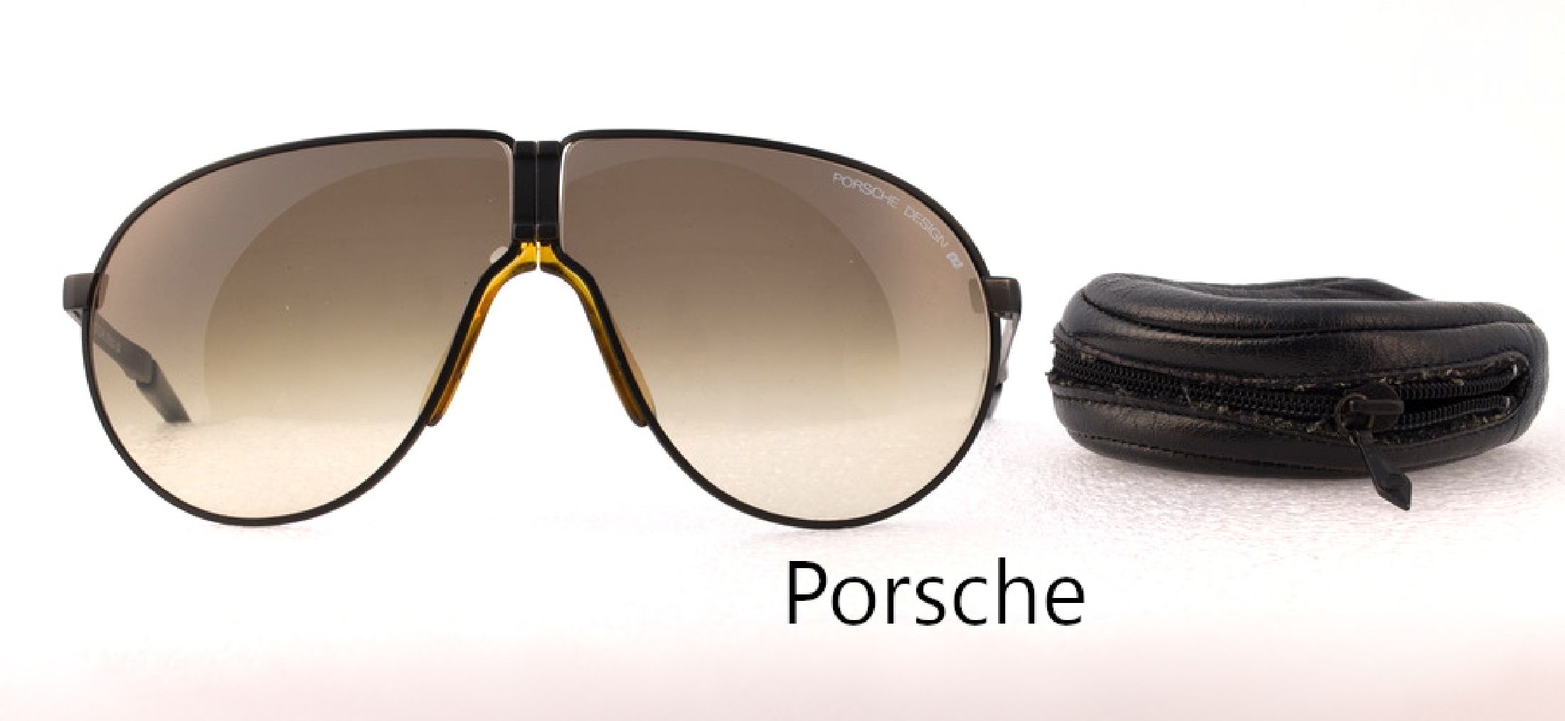 PORSCHE DESIGN Sonnenbrille, zusammenklappbar, Rahmen mattschwarz, in orig.Lederetui, Gebr.-Spuren