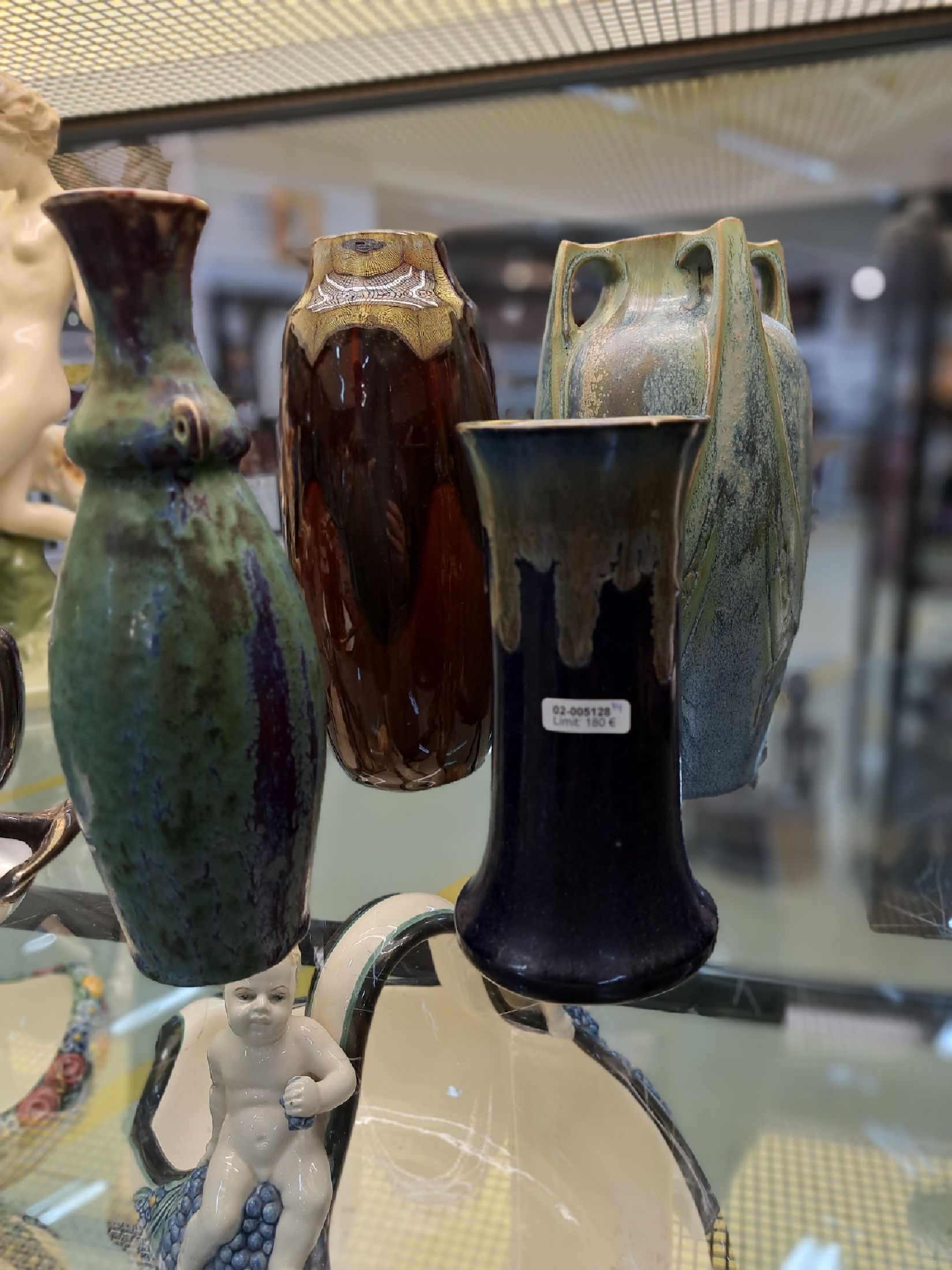 Detail a: Vier Jugendstilvasen, Frankreich, um 1900, 1. Danbac, mit vier Henkeln, grünlich- blaue Laufglasur, H. ca. 24 cm, 2. Vase Auguste Delaherche, ...