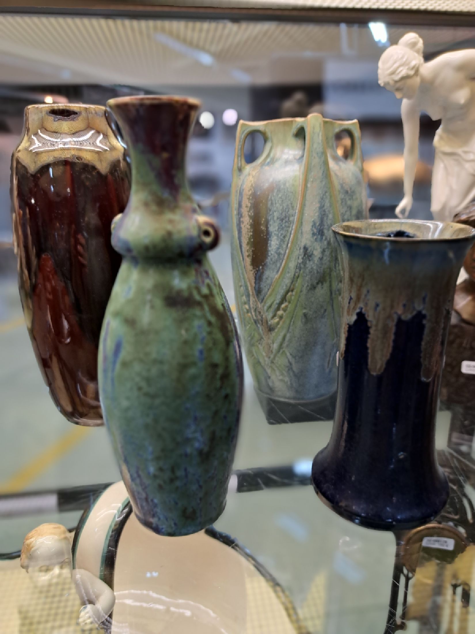 Detail e: Vier Jugendstilvasen, Frankreich, um 1900, 1. Danbac, mit vier Henkeln, grünlich- blaue Laufglasur, H. ca. 24 cm, 2. Vase Auguste Delaherche, ...