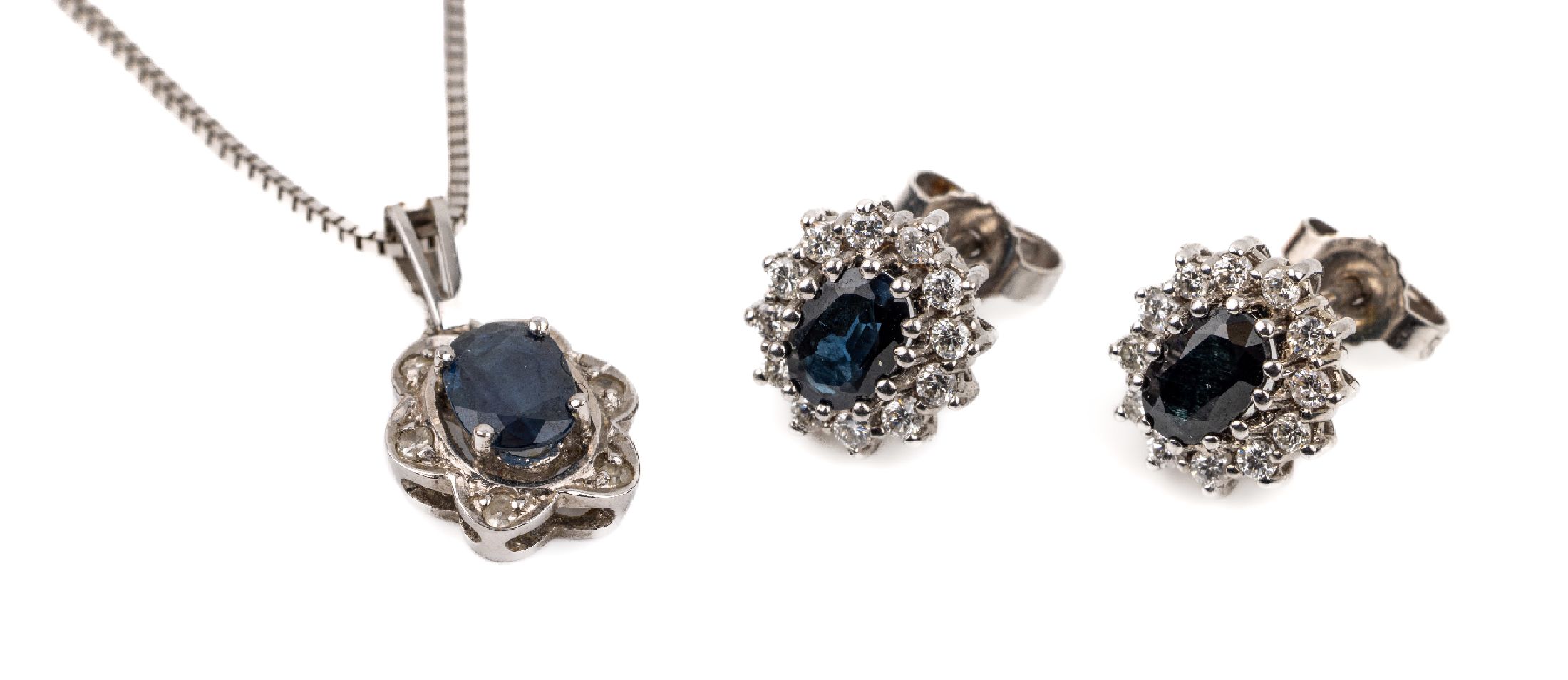 14 kt Gold Saphir-Diamant-Konvolut: Paar Ohrstecker WG 585/000, 2 ovalfacett. Saphire zus. ca. 1.40 ct, 24 Brillanten zus. ca. 0.35 ct Weiß/si, ...