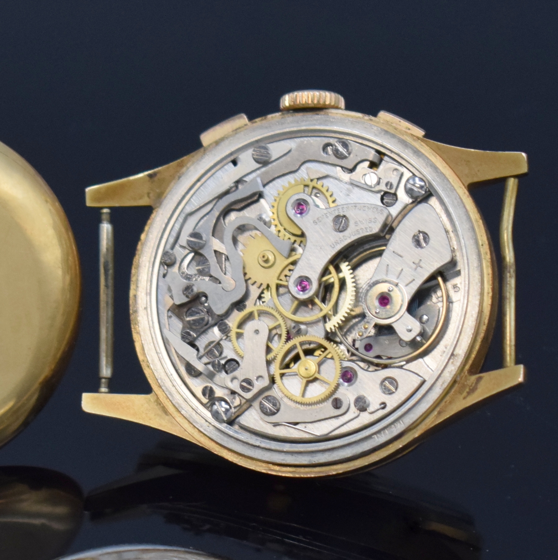 Detail e: BENMORE / CHRONOGRAPHE SUISSE Herrenchronograph in RG 750/000, Schweiz um 1950, Handaufzug, Boden aufgedr., kupferfarb. Zifferbl. m. gold. Std.-Ind. ...
