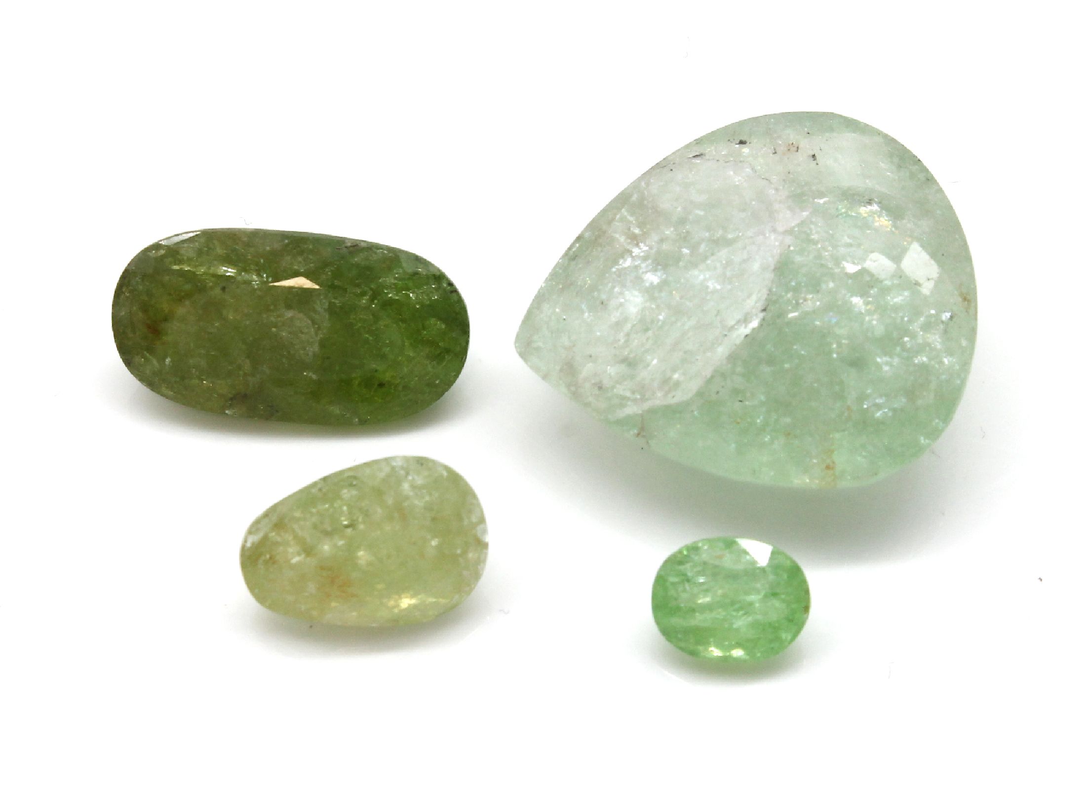 Konvolut 4 lose Paraiba Turmaline: 1 x ca. 42.32 ct, facett. Tropfen, ca. 26.18 x23.36 x 10.17 mm, besch., rissig; 1 x ca. 2.36 ct, ovalfacett. ca. ...