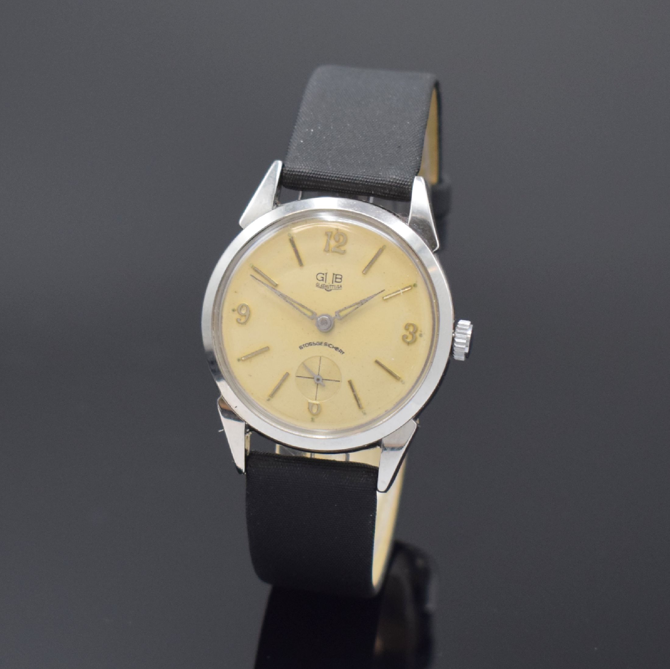 GUB Glashütte Armbanduhr im ROWI Gehäuse, Deutschland um 1950, Handaufzug, Geh. in Stahl, Boden verschr., Zifferbl. rest., aufges. Std.-Ind., ...
