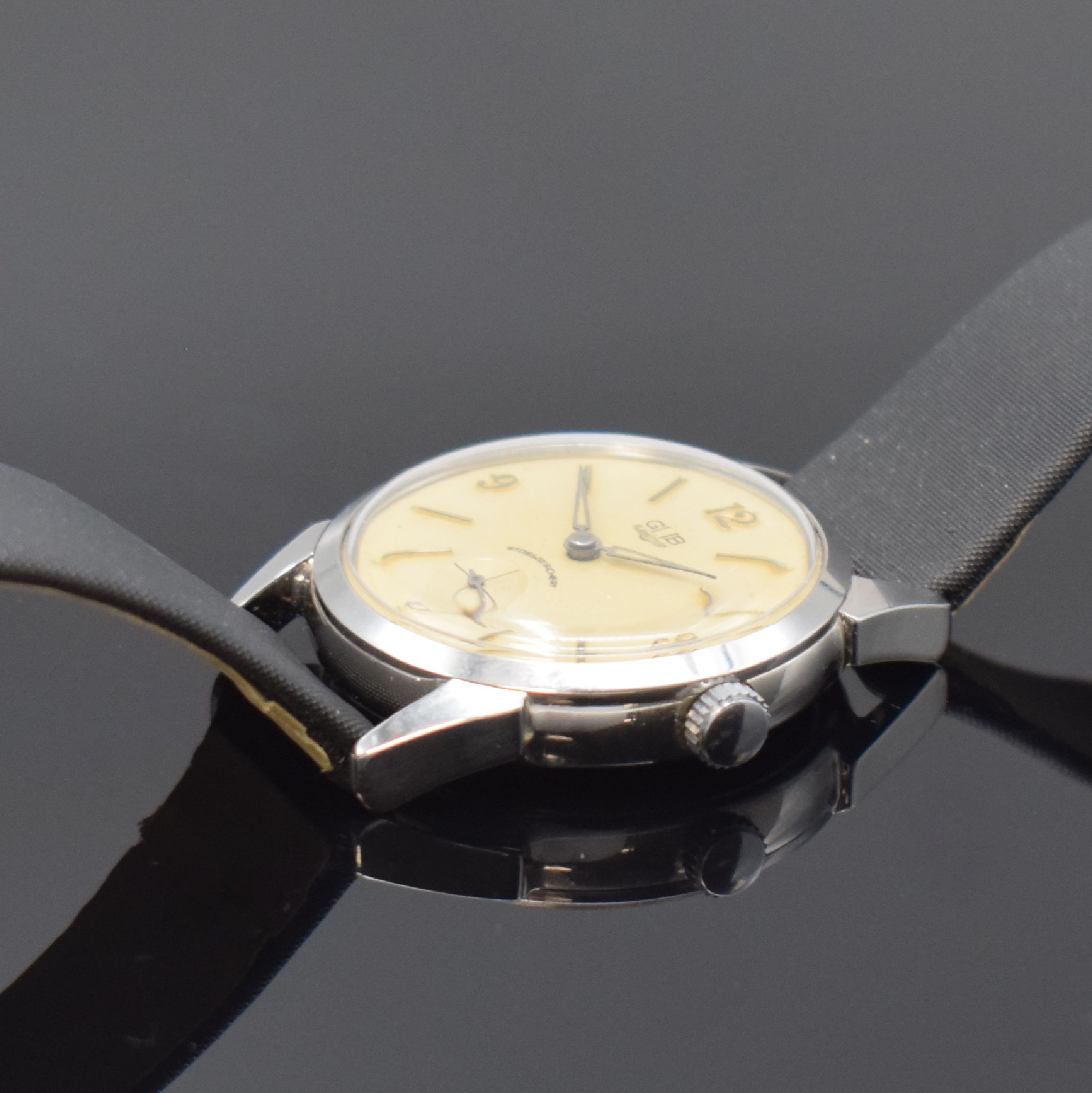 Detail b: GUB Glashütte Armbanduhr im ROWI Gehäuse, Deutschland um 1950, Handaufzug, Geh. in Stahl, Boden verschr., Zifferbl. rest., aufges. Std.-Ind., ...