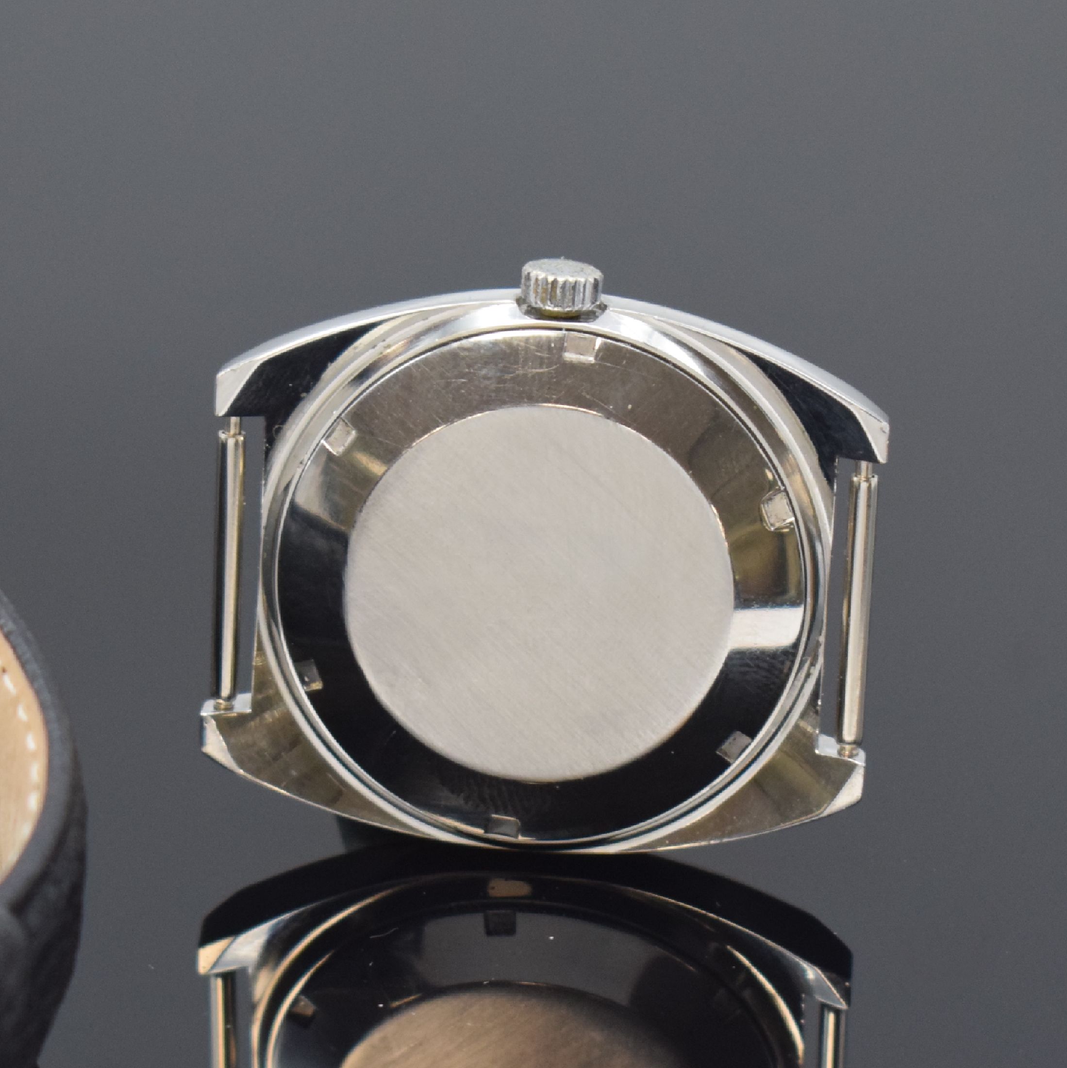 Detail d: ALPINA, DUGENA und Tutima 3 Armbanduhren in Stahl, Schweiz 1970er Jahre, Automatik, Böden verschr., 1) Alpina Futura, unsign. Geh., silb./blaues ...
