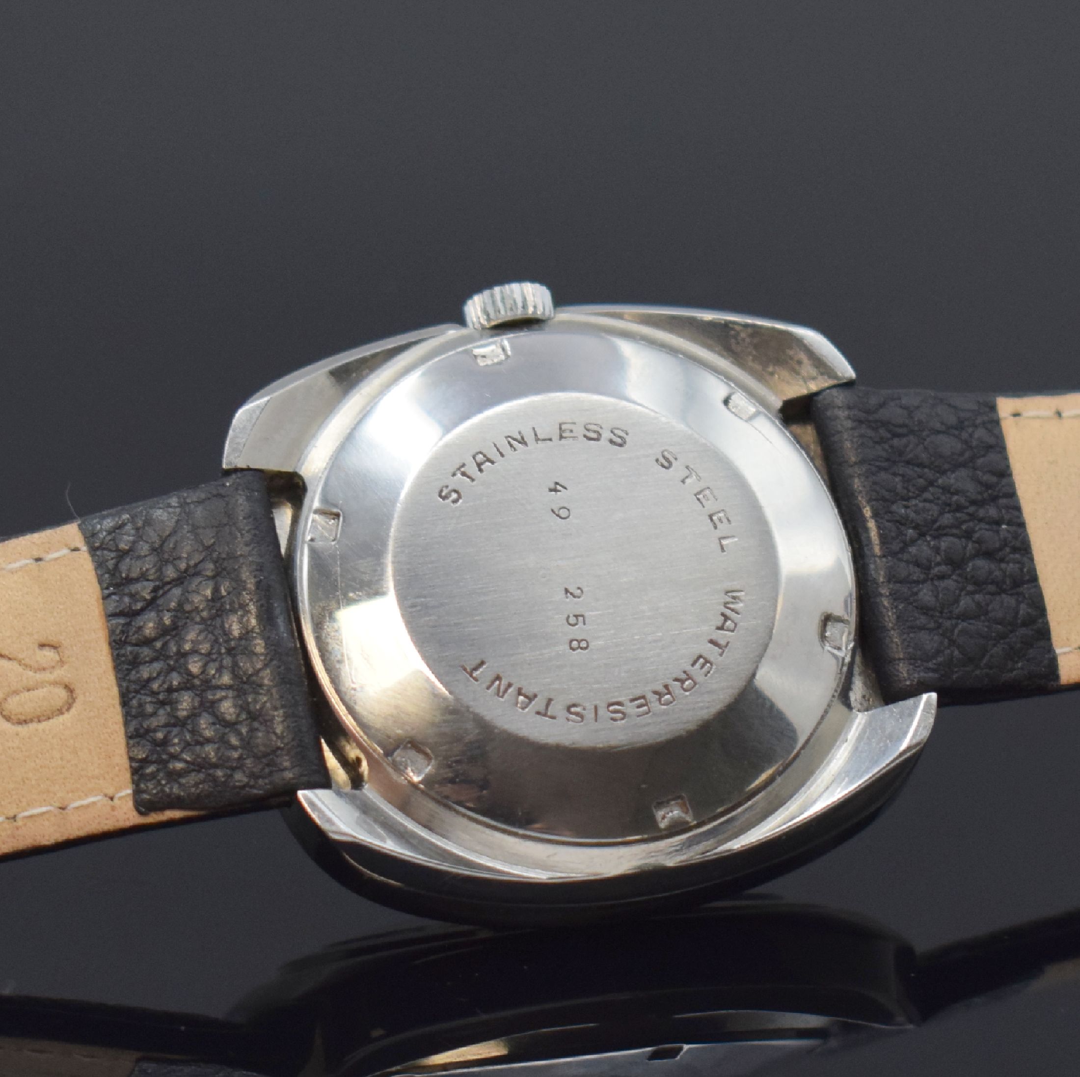 Detail e: ALPINA, DUGENA und Tutima 3 Armbanduhren in Stahl, Schweiz 1970er Jahre, Automatik, Böden verschr., 1) Alpina Futura, unsign. Geh., silb./blaues ...