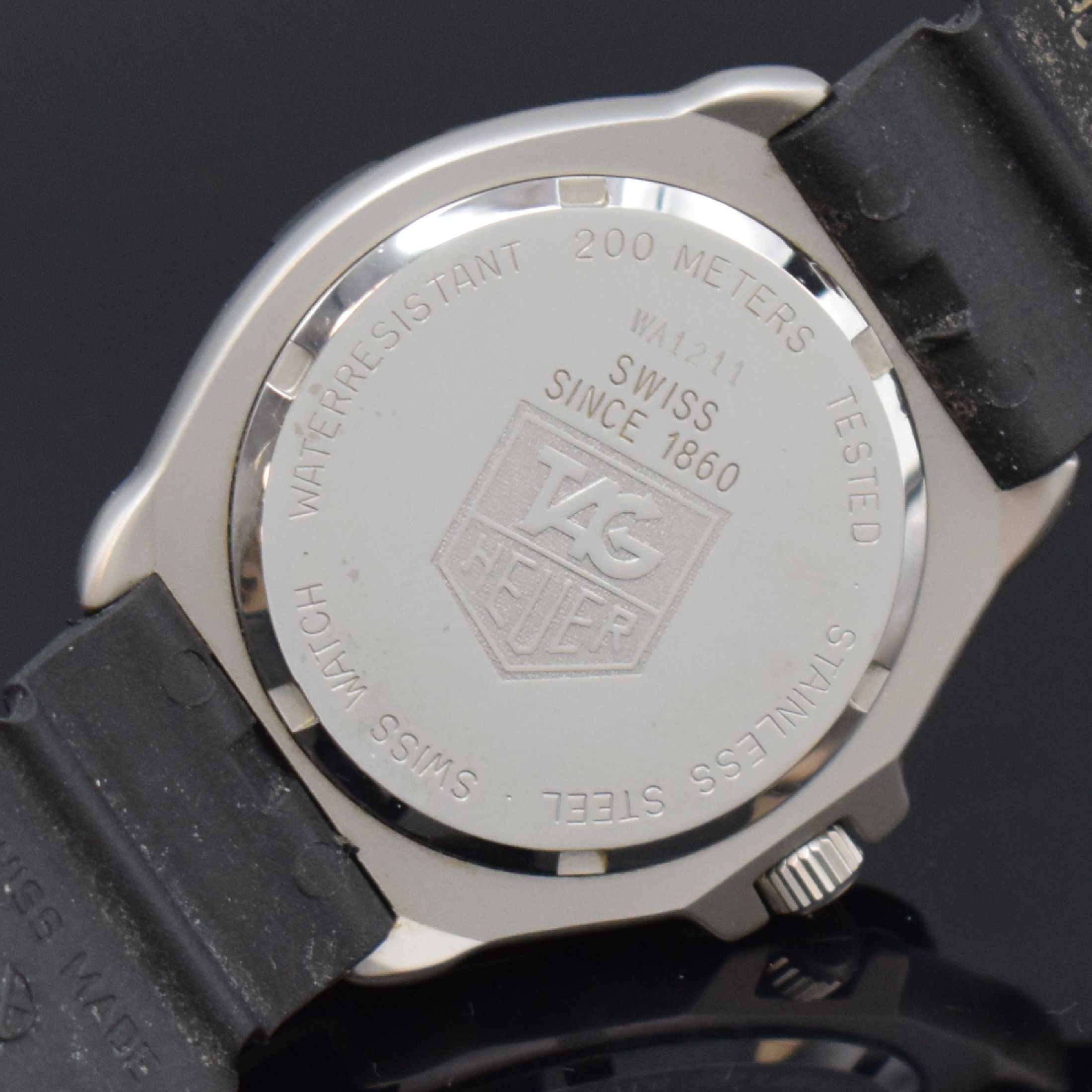 Detail d: TAG HEUER Professional Formula 1 Armbanduhr in Stahl Referenz WA1211, Schweiz um 1995, quarz, matt. Geh., Boden verschr., orig. Kautschukband m. ...
