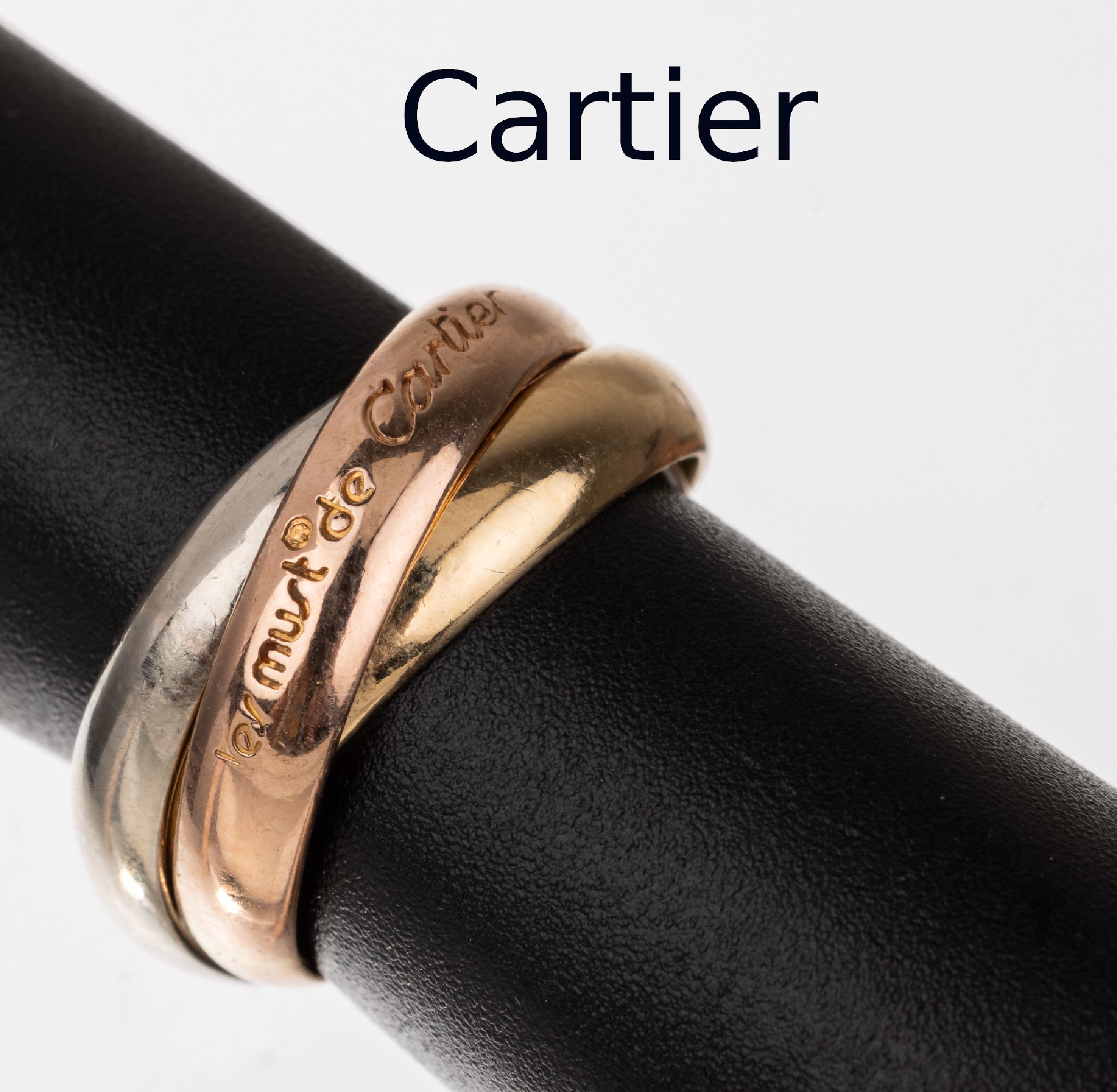 18 kt Gold must de CARTIER Ring/Anhänger, GG/WG/RG 750/000, aus der Trinity-Serie, sign., num., RW 44, mit Zertifikat