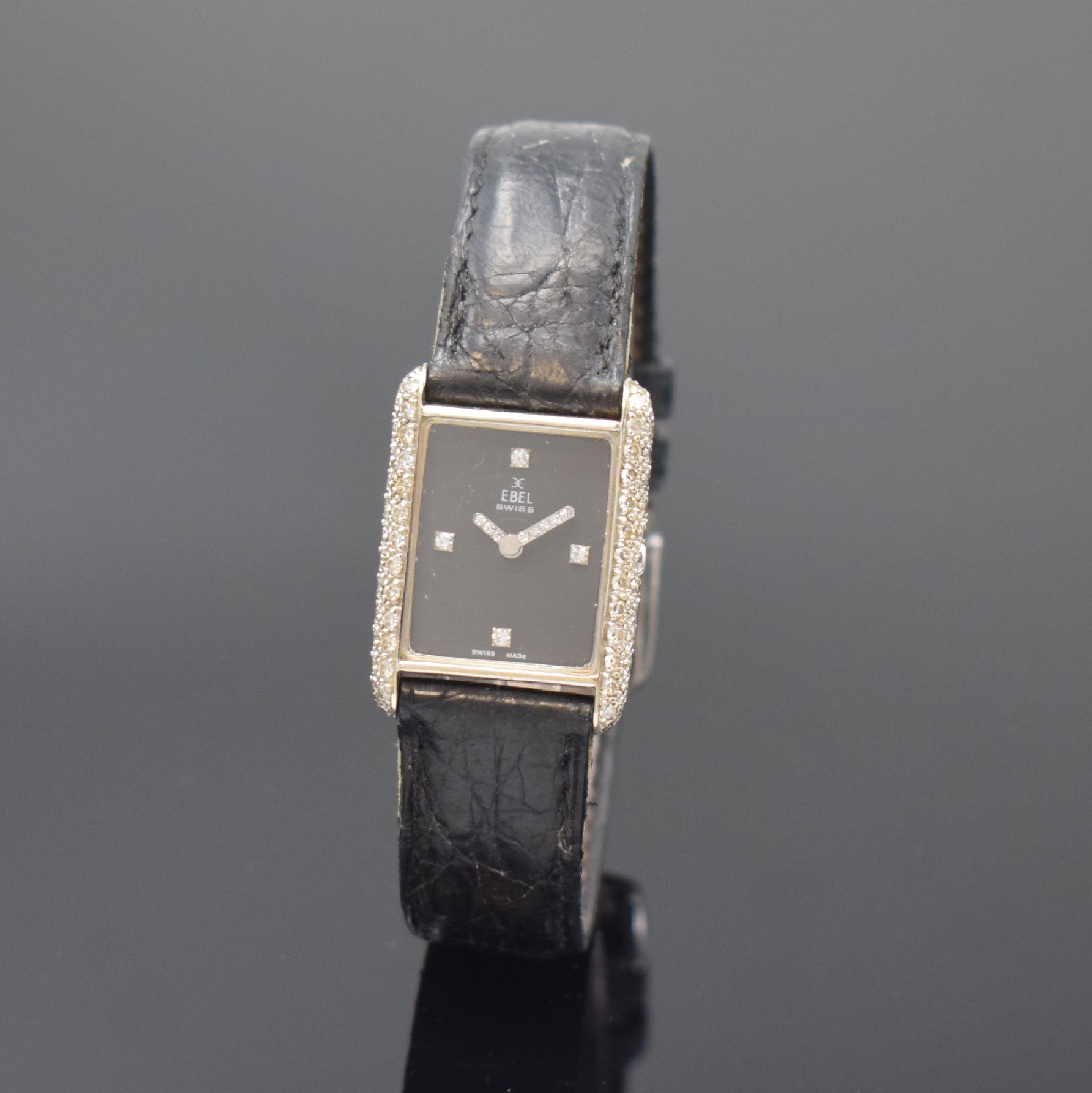 EBEL Damenarmbanduhr in WG 750/000, Handaufzug, Schweiz um 1970, 2-teil. Geh. aufw. m. Diamanten bes., schwarzes Zifferbl. m. 4 Diamantindizes, ...