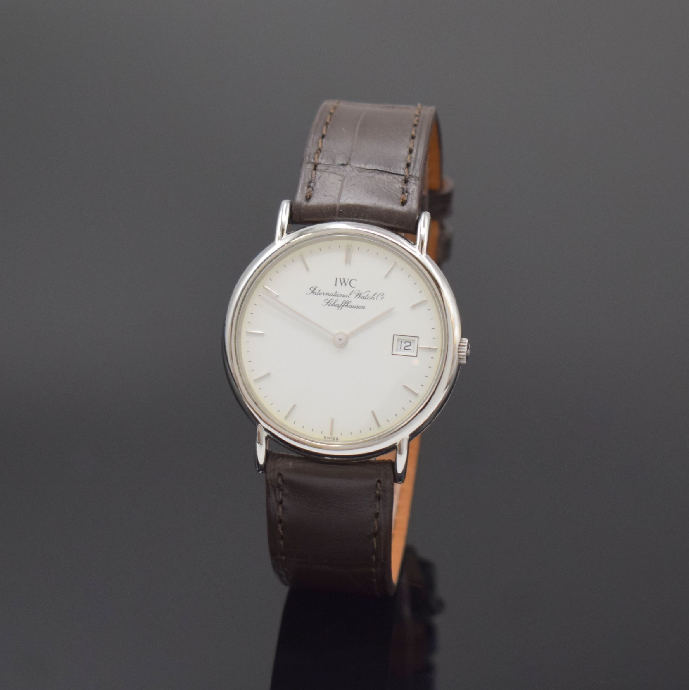 IWC Herrenarmbanduhr Serie Portofino Referenz 3331, Schweiz um 1990, Edelstahlgeh. inkl. Lederband m. orig. Dornschl., Boden 4-fach verschr., ...