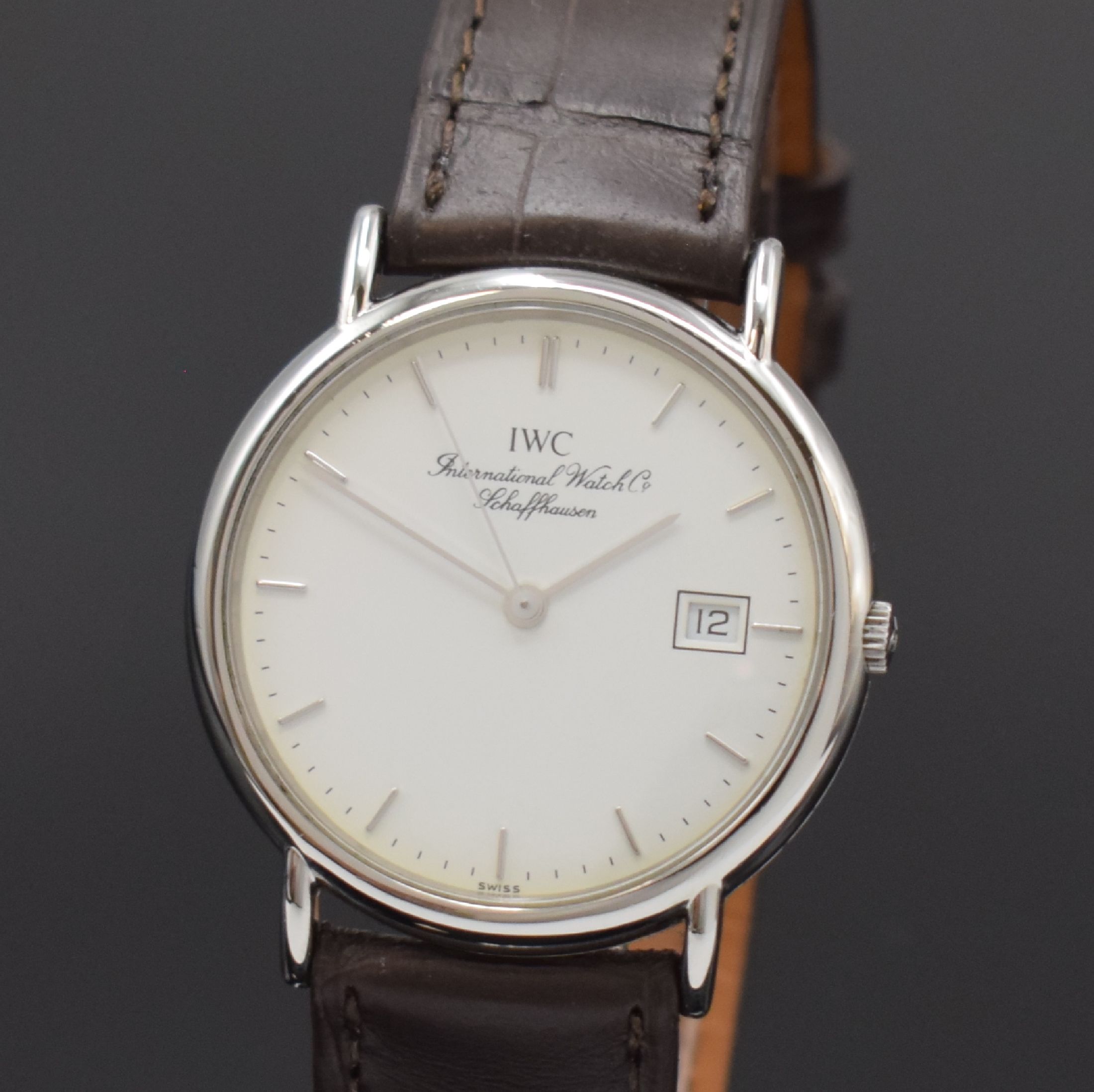 Detail a: IWC Herrenarmbanduhr Serie Portofino Referenz 3331, Schweiz um 1990, Edelstahlgeh. inkl. Lederband m. orig. Dornschl., Boden 4-fach verschr., ...