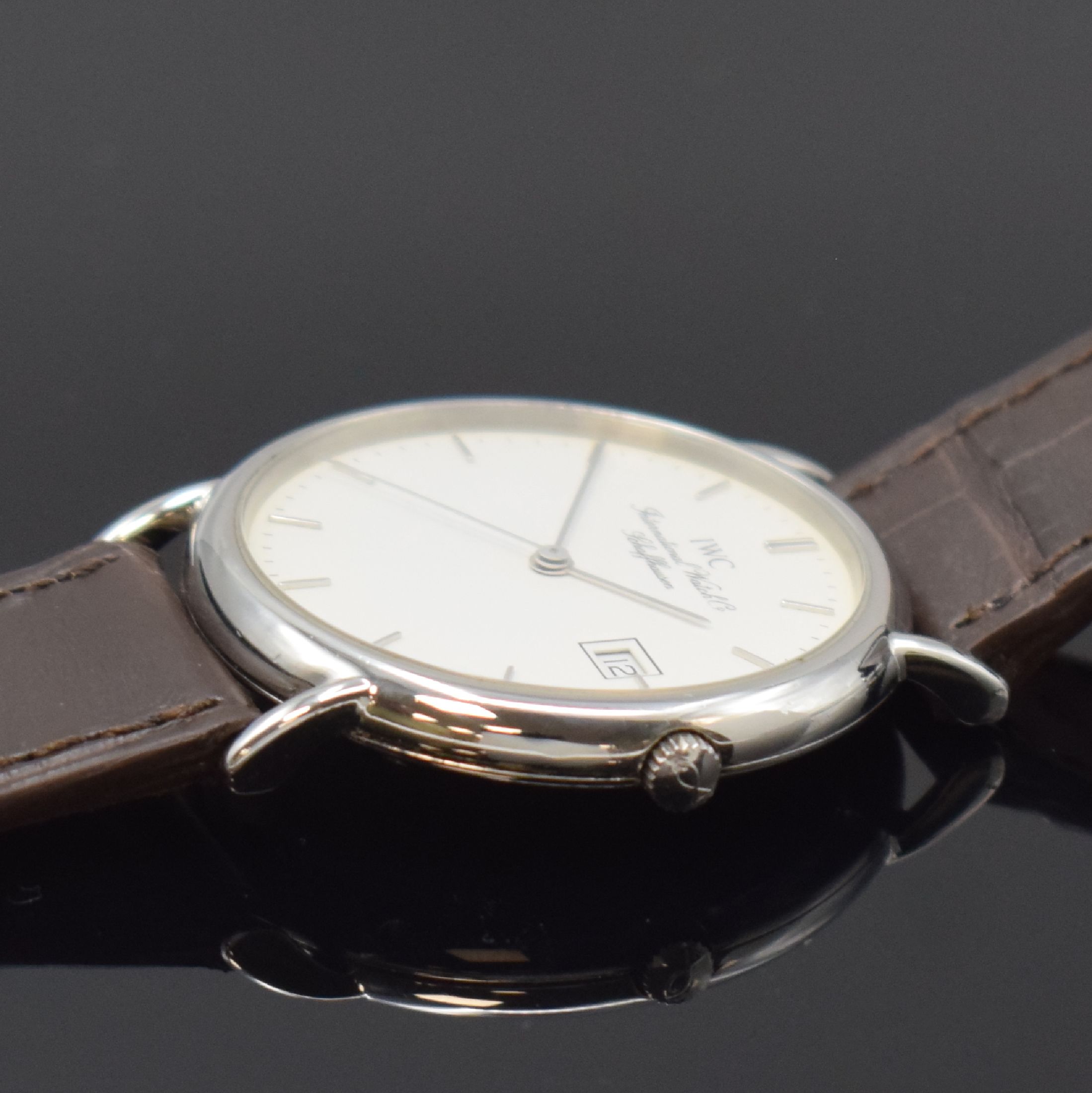 Detail c: IWC Herrenarmbanduhr Serie Portofino Referenz 3331, Schweiz um 1990, Edelstahlgeh. inkl. Lederband m. orig. Dornschl., Boden 4-fach verschr., ...