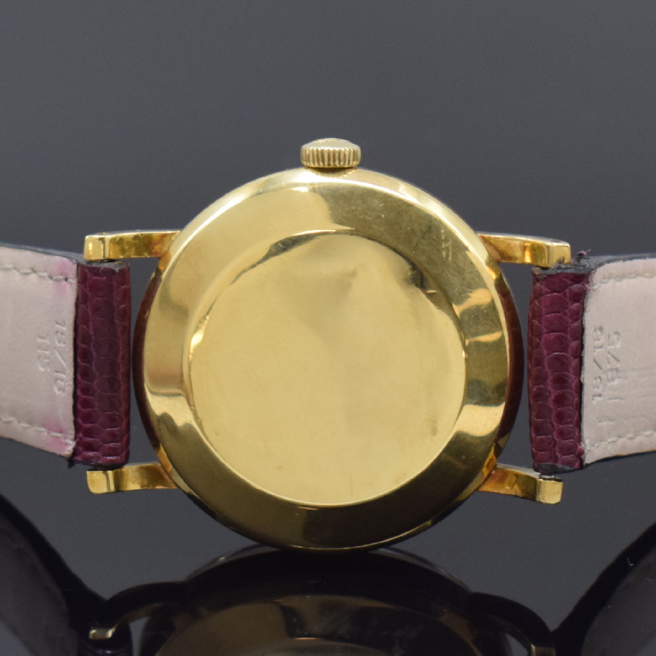 Detail c: IWC Herrenarmbanduhr in GG 750/000, Schweiz um 1957, Automatik, 3-teil. Geh. l. dell., Boden und Glasrand aufgedr., silb. Zifferbl. mit aufges. gold. ...