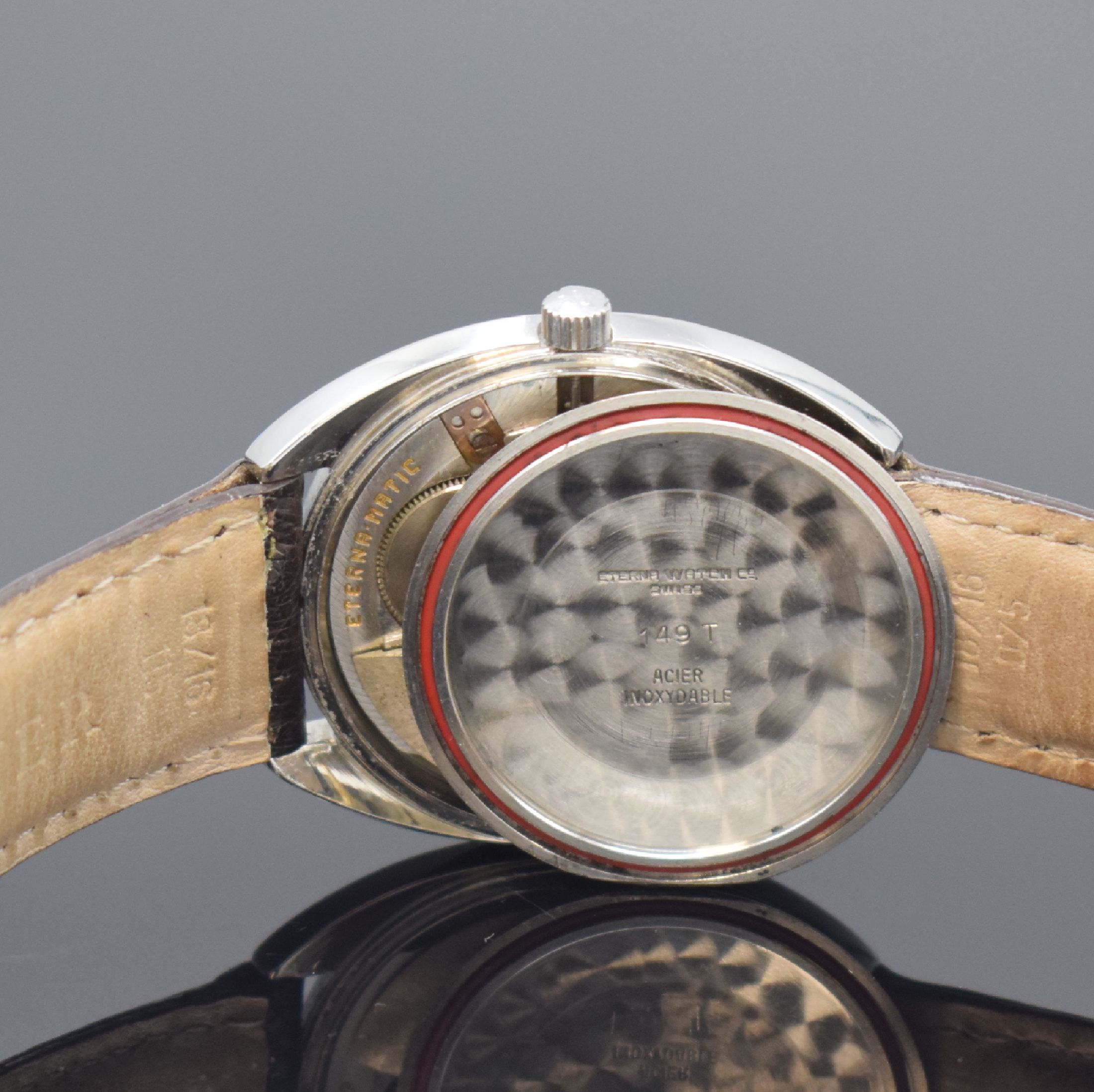 Detail f: ETERNA MATIC Herrenarmbanduhr in Stahl Referenz 149 T, Automatik, Schweiz um 1970, silb. Zifferbl. m. aufgel. Indizes altersbed. fl./pat., Datum b. ...
