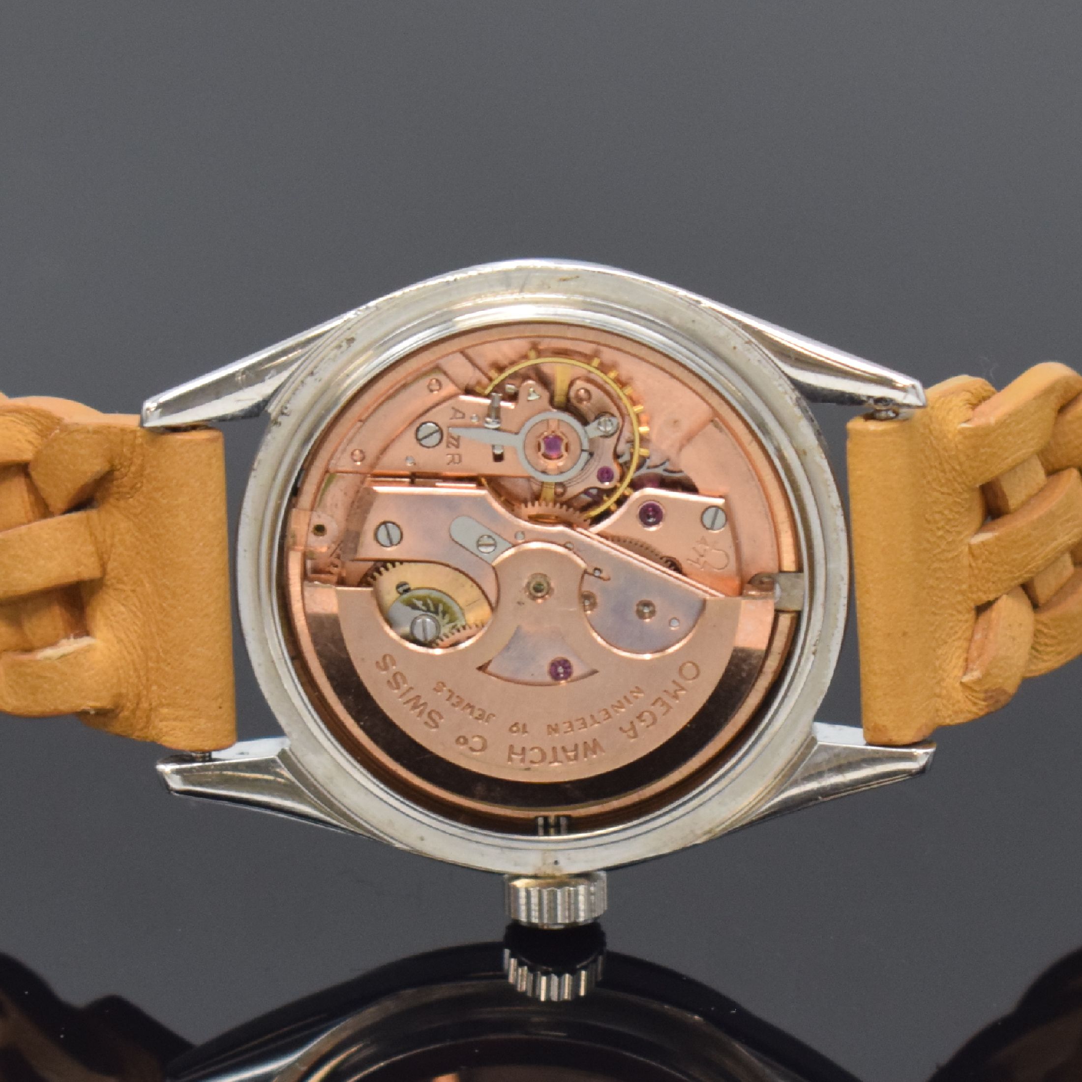 Detail e: OMEGA Automatik Armbanduhr Referenz 2802 - 1SC, Schweiz um 1956, Edelstahlgeh., Boden und Glasrand aufgedr., silb. Zifferbl. m. aufgel. Std.-Zeichen ...