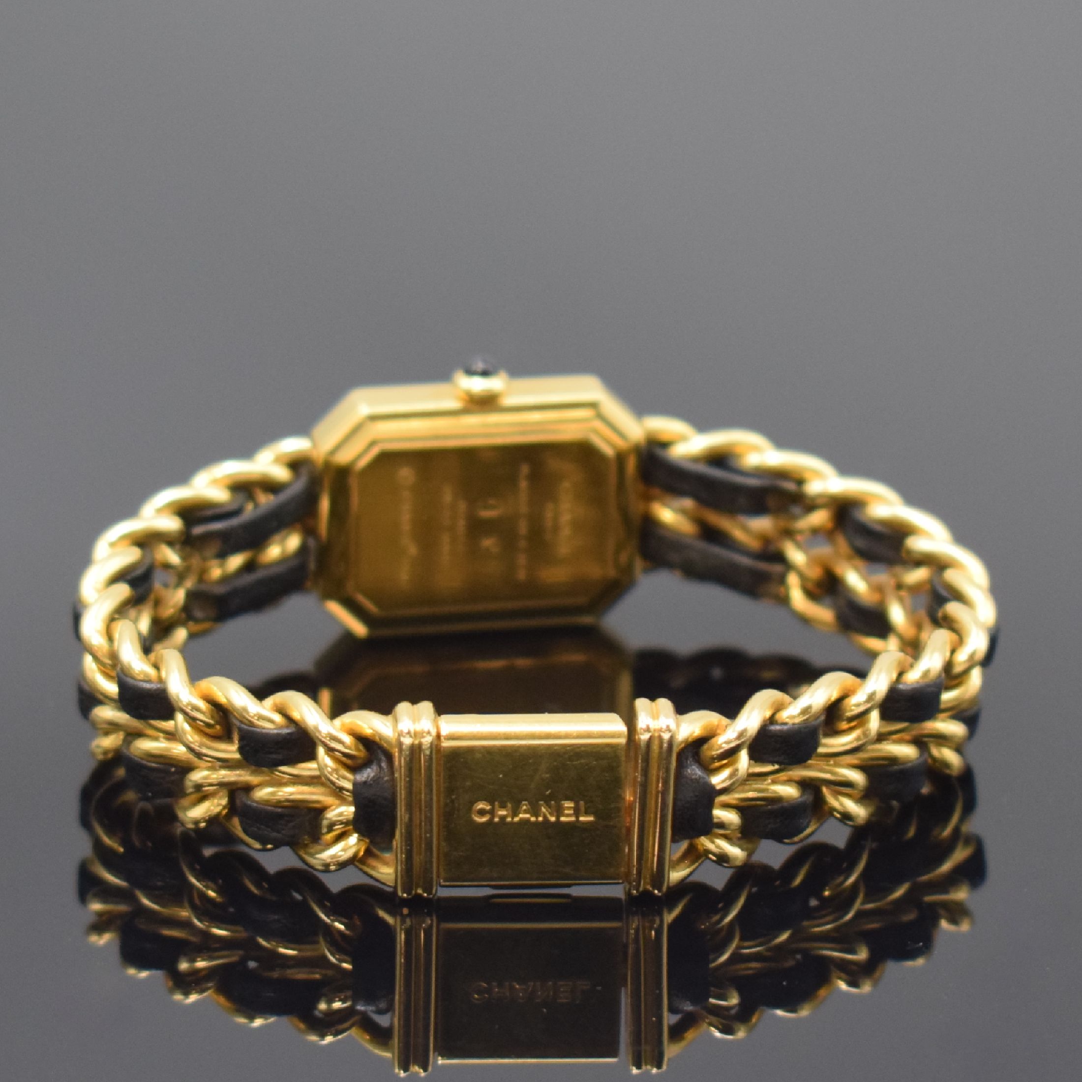 Detail b: CHANEL Damenarmbanduhr Modell Premiere, Schweiz um 1987, quarz, verg. Geh. m. Schmuckkrone, Boden aufgedr., verg. Gliederband m. Leder (Leder besch.) ...