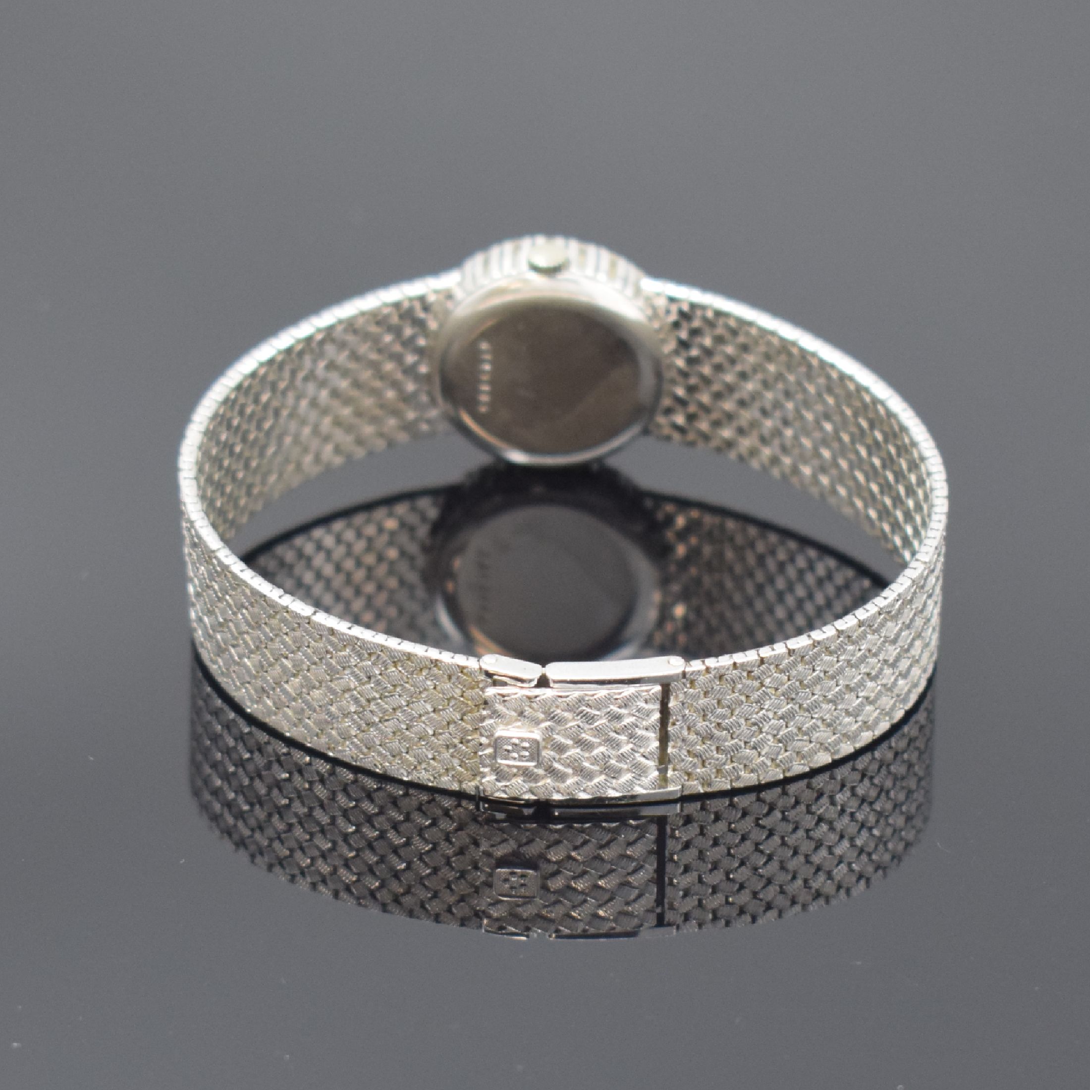 Detail d: ETERNA Damenarmbanduhr in WG 750/000, Schweiz um 1970, Handaufzug, 2-teil. Gehäuse, Boden aufgedr., Lünette m. Diamanten bes., silb. Zifferbl. m. ...