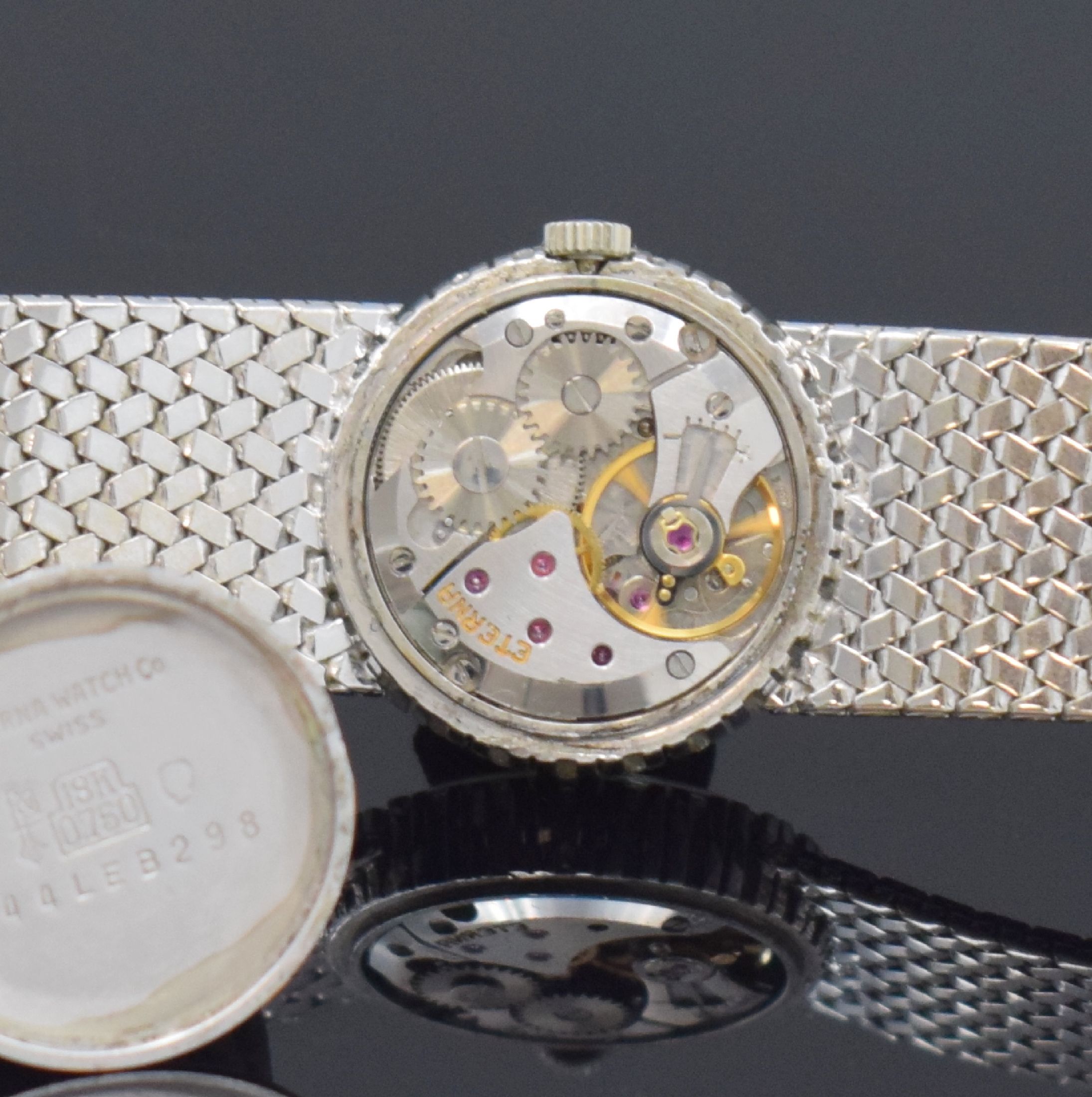Detail f: ETERNA Damenarmbanduhr in WG 750/000, Schweiz um 1970, Handaufzug, 2-teil. Gehäuse, Boden aufgedr., Lünette m. Diamanten bes., silb. Zifferbl. m. ...