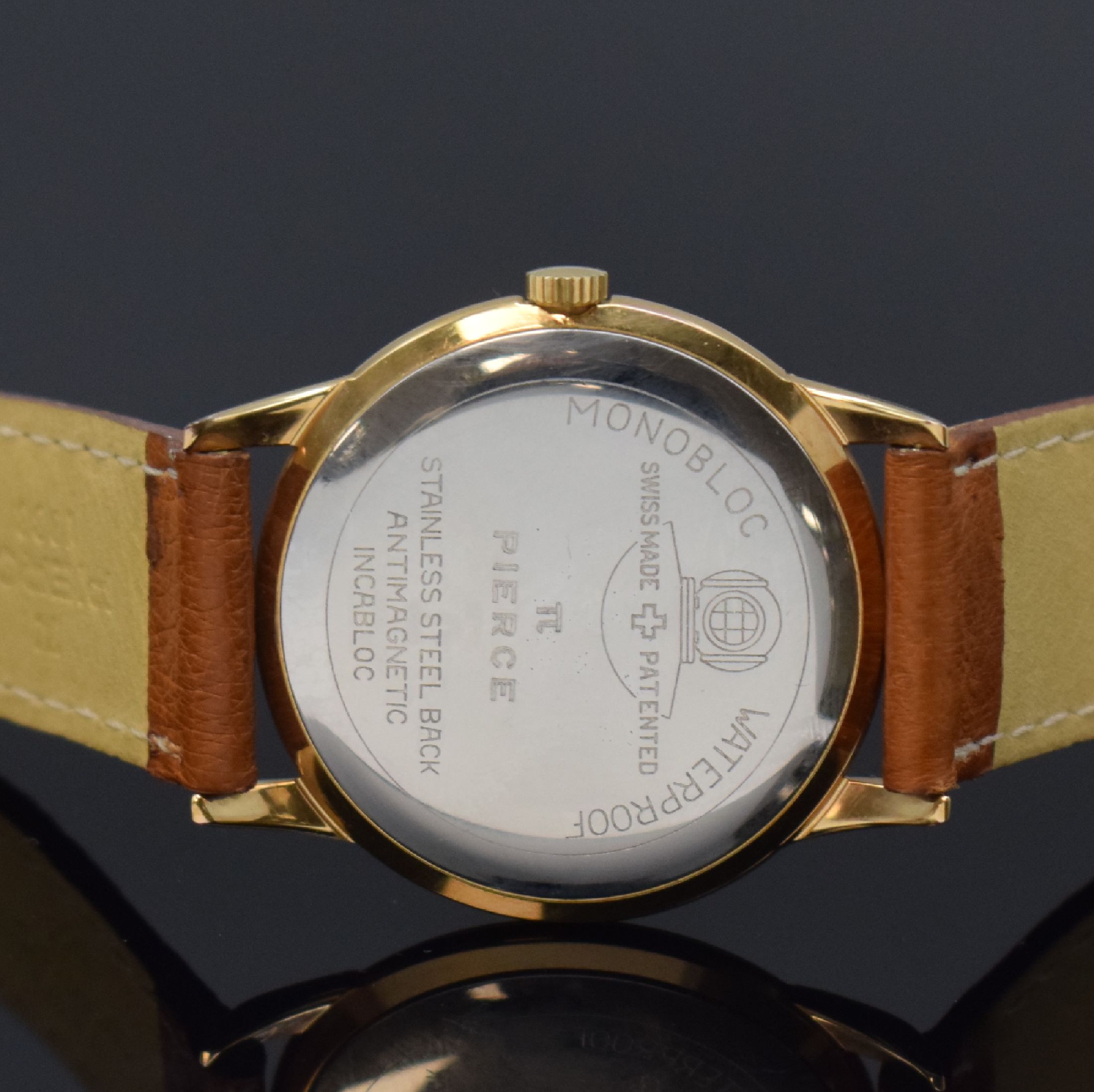Detail c: PIERCE große, nahezu neuwertige Armbanduhr im Monobloc-Kompressor-Gehäuse, Schweiz um 1955, Handaufzug, flaches verg. Geh. m. Stahlboden, silb. ...