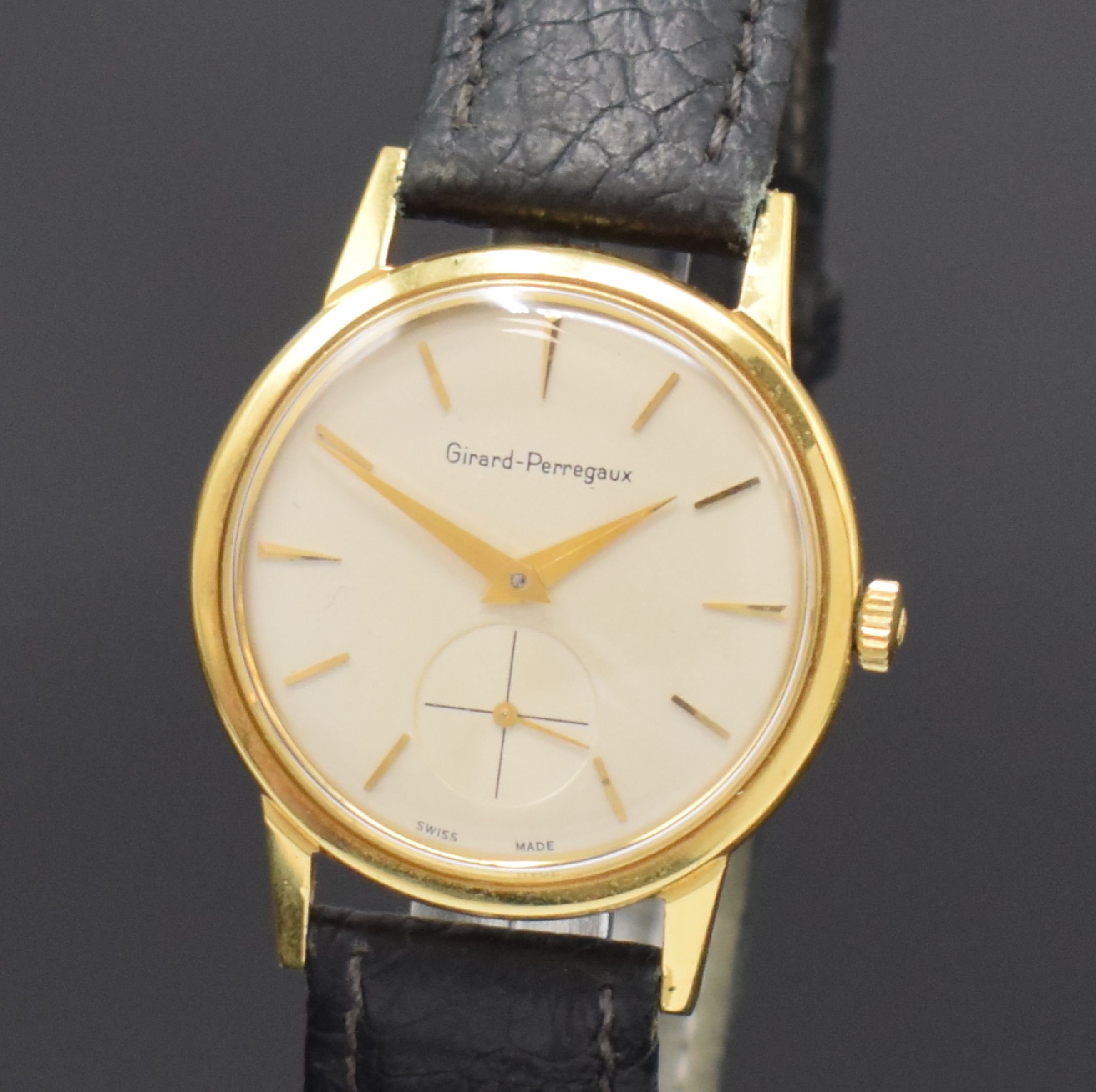 Detail a: GIRARD PERREGAUX Armbanduhr in GG 750/000, Schweiz um 1955, Handaufzug, Boden verschr., silb. Zifferbl. rest., gold. Std.-Ind., gold. Zeiger, kl. ...