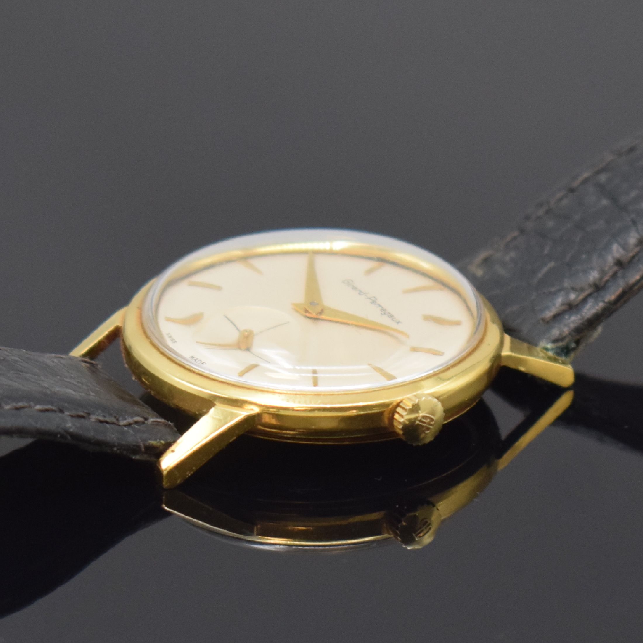 Detail b: GIRARD PERREGAUX Armbanduhr in GG 750/000, Schweiz um 1955, Handaufzug, Boden verschr., silb. Zifferbl. rest., gold. Std.-Ind., gold. Zeiger, kl. ...