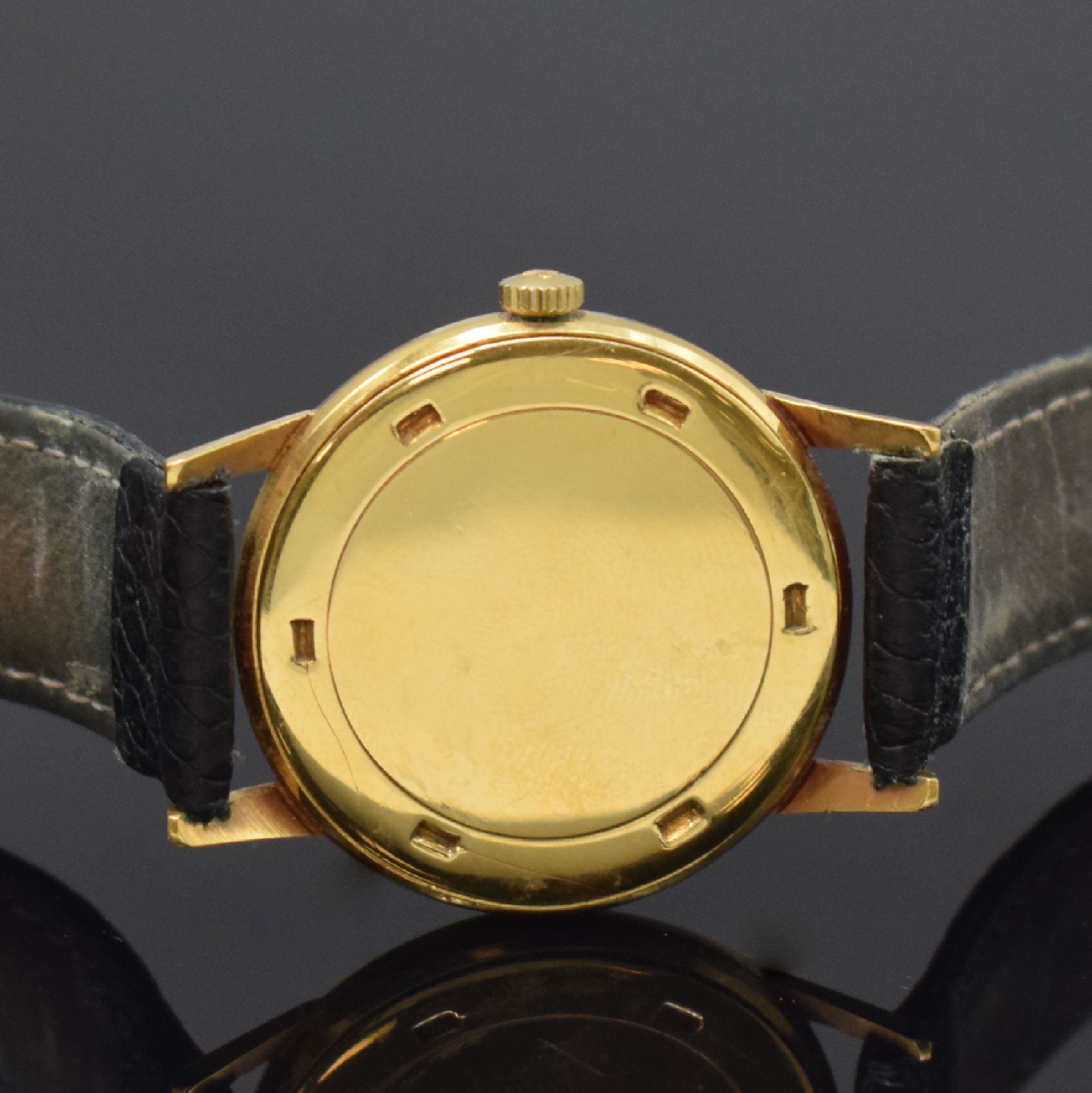 Detail c: GIRARD PERREGAUX Armbanduhr in GG 750/000, Schweiz um 1955, Handaufzug, Boden verschr., silb. Zifferbl. rest., gold. Std.-Ind., gold. Zeiger, kl. ...