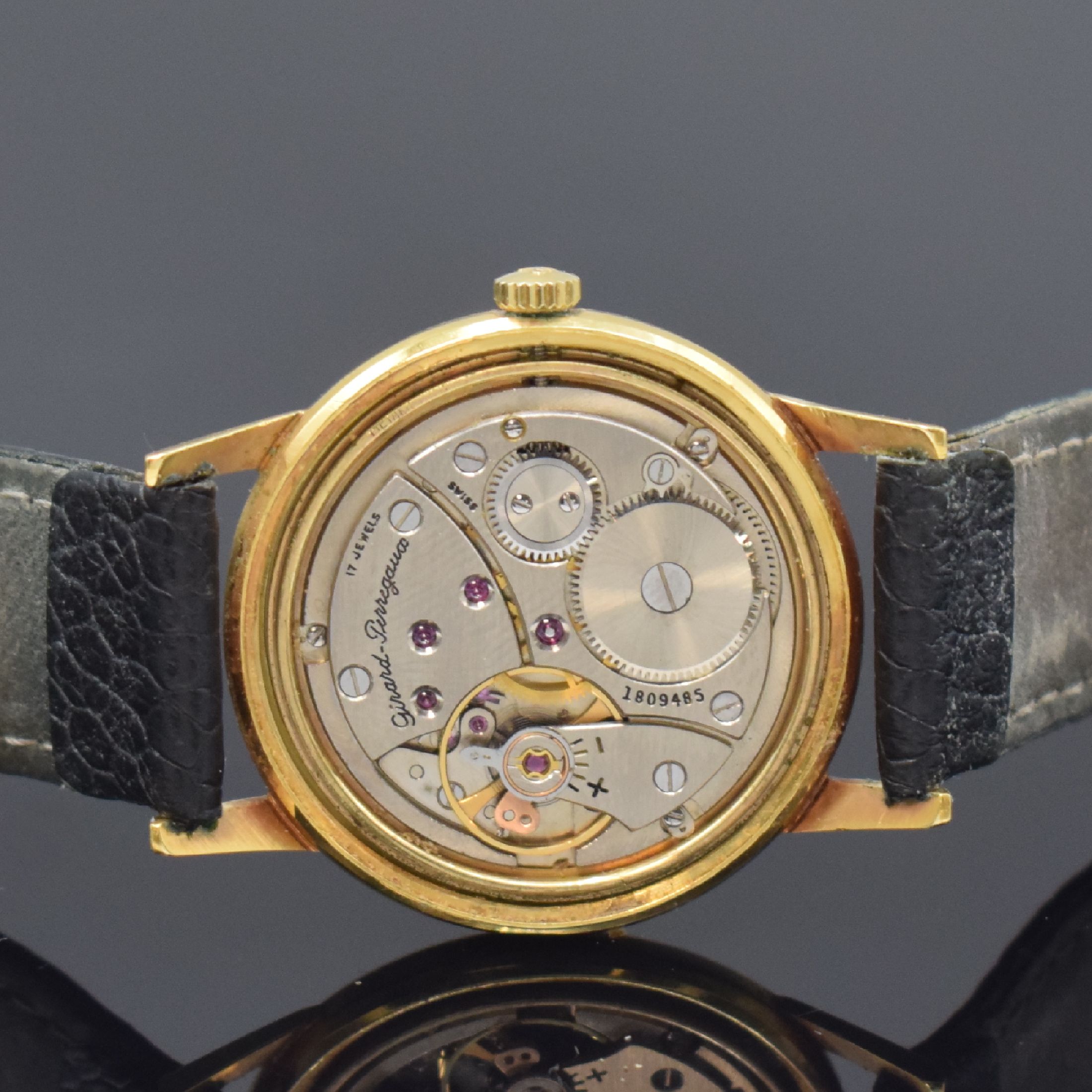 Detail d: GIRARD PERREGAUX Armbanduhr in GG 750/000, Schweiz um 1955, Handaufzug, Boden verschr., silb. Zifferbl. rest., gold. Std.-Ind., gold. Zeiger, kl. ...