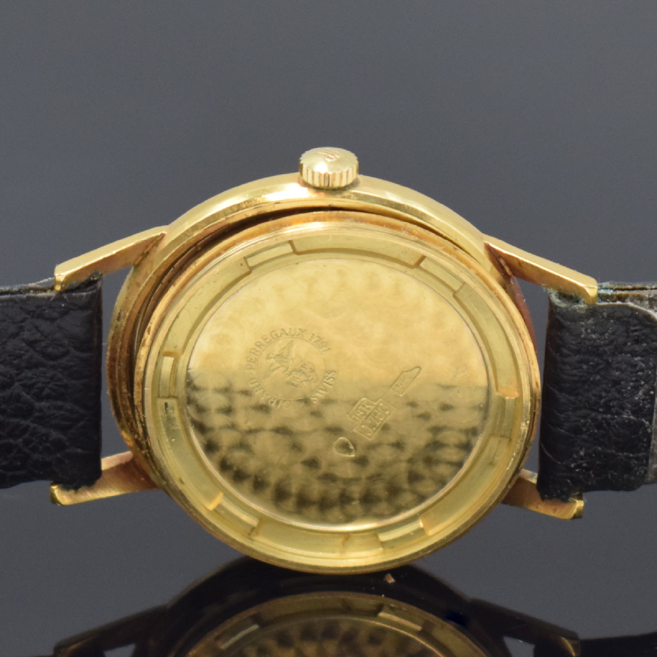 Detail e: GIRARD PERREGAUX Armbanduhr in GG 750/000, Schweiz um 1955, Handaufzug, Boden verschr., silb. Zifferbl. rest., gold. Std.-Ind., gold. Zeiger, kl. ...
